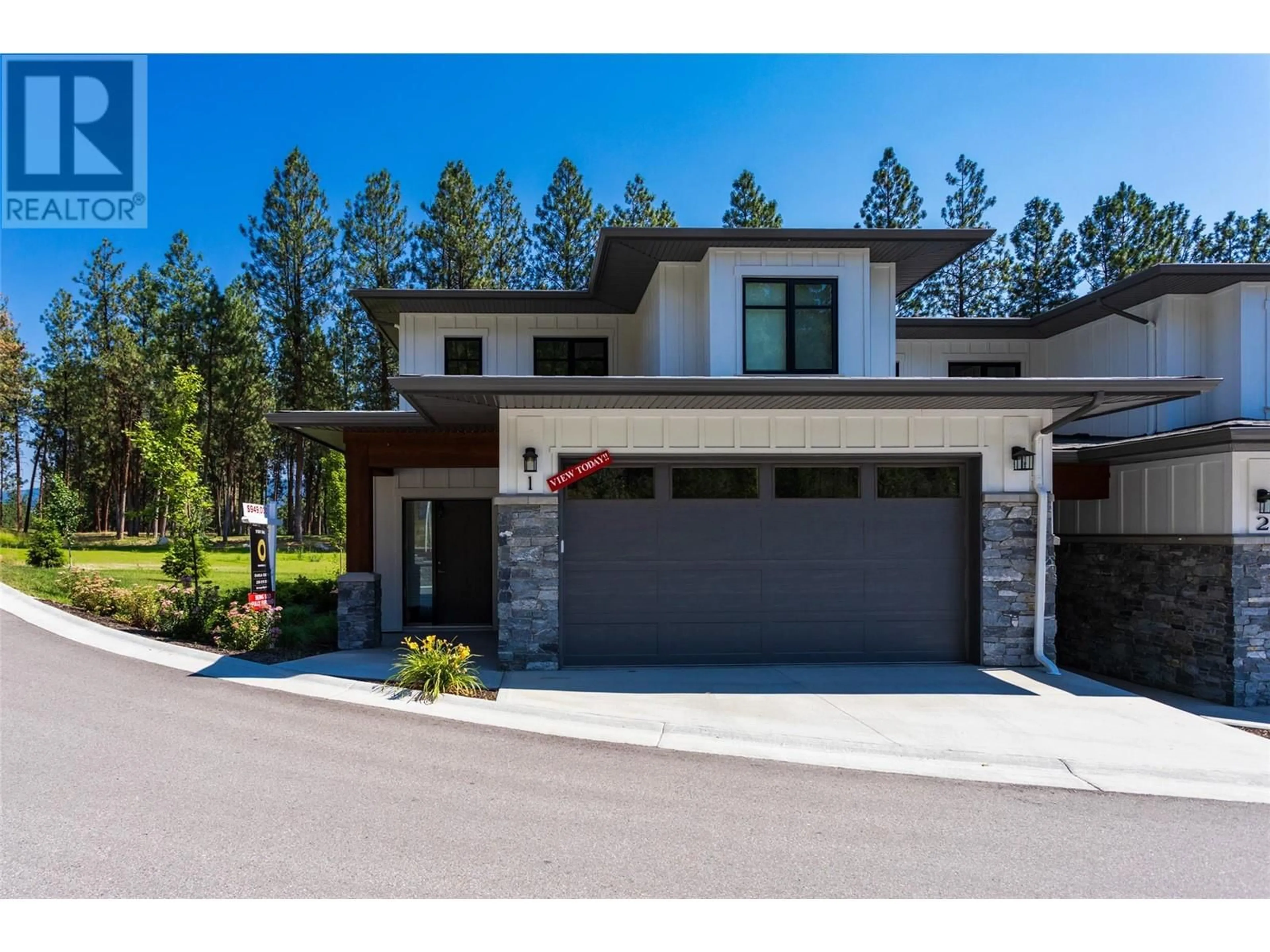 Home with brick exterior material for 1979 Country Club Drive Unit# 1, Kelowna British Columbia V1V2M6