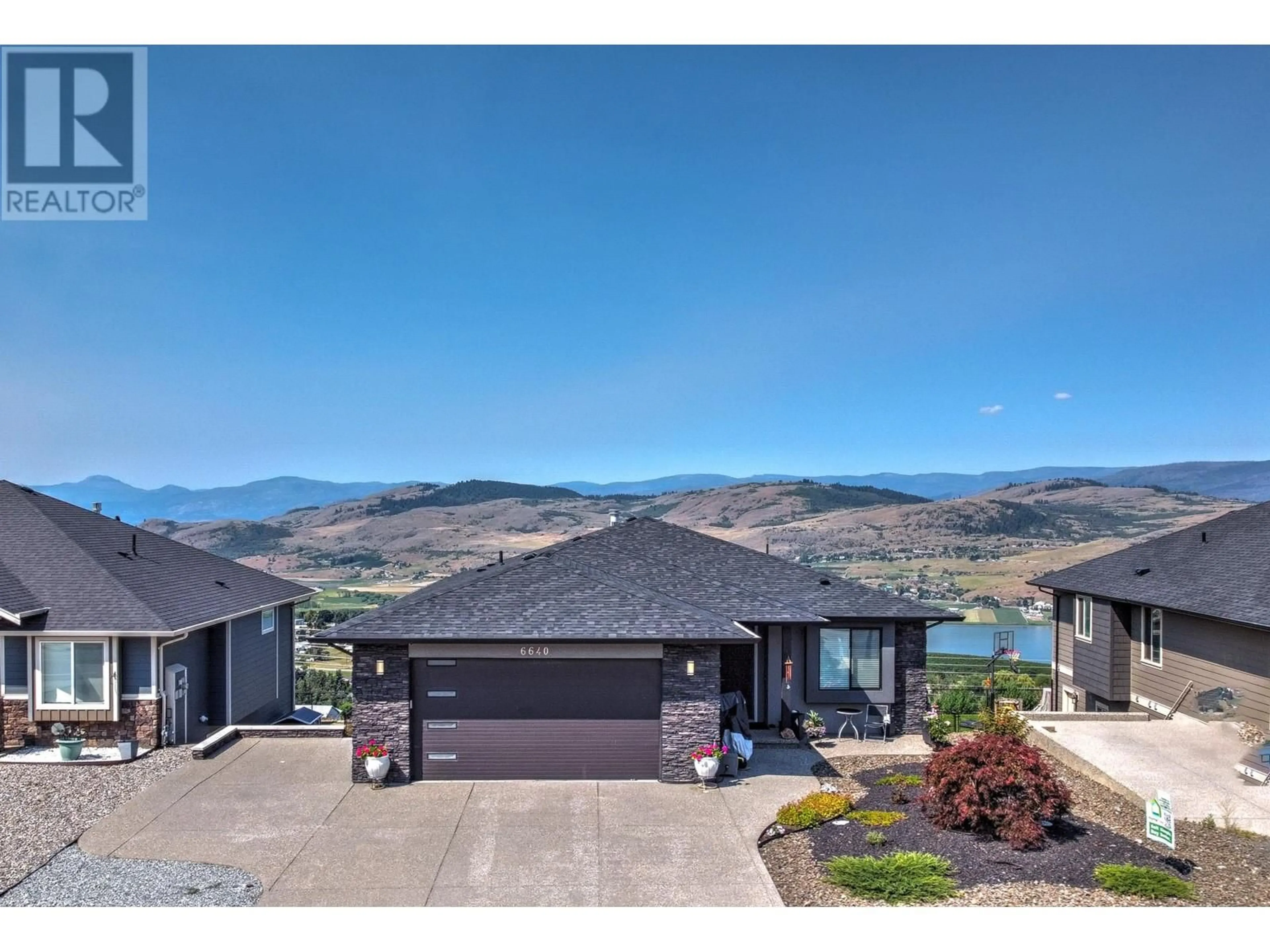 Frontside or backside of a home for 6640 Blackcomb Way, Vernon British Columbia V1B4E8