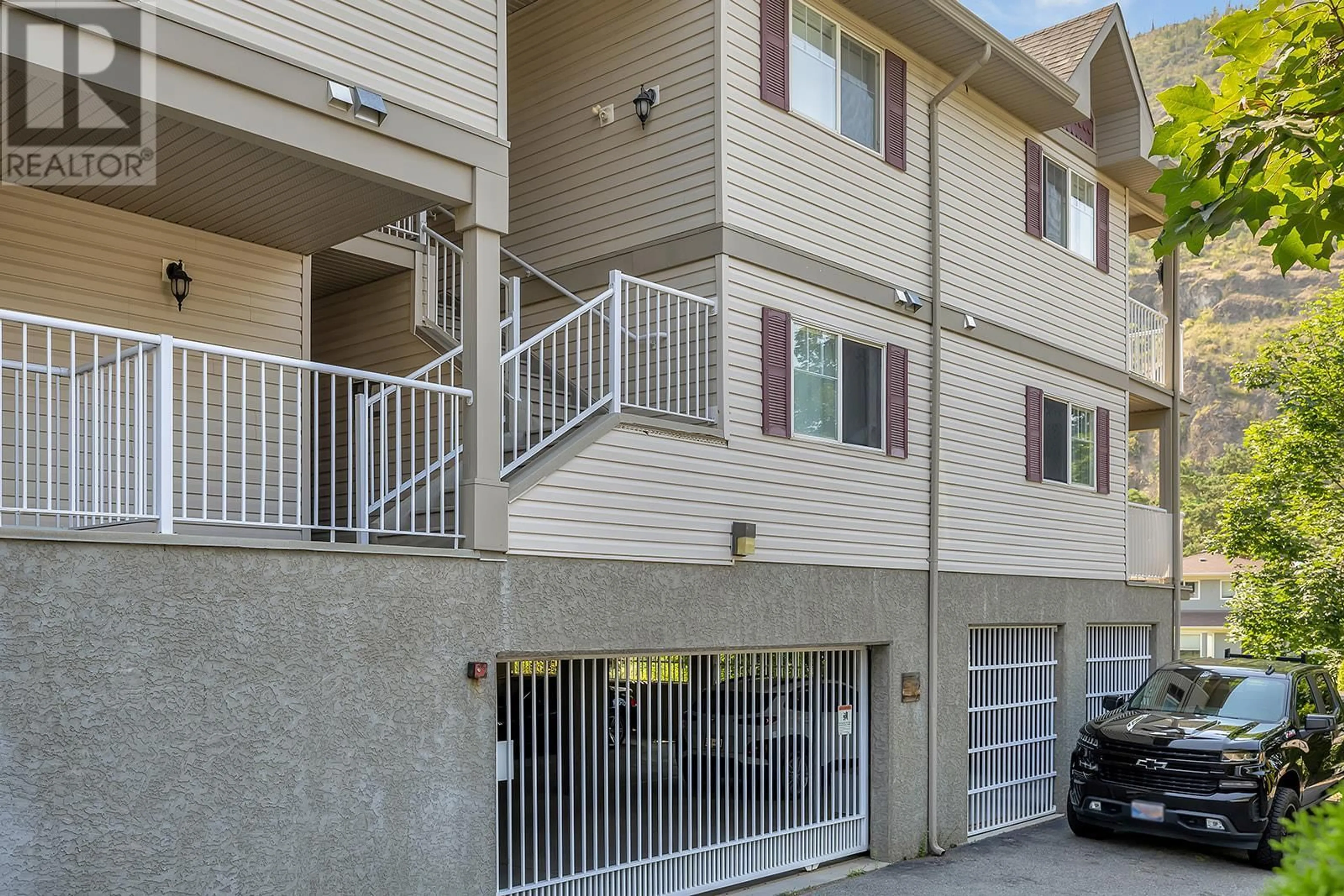 A pic from exterior of the house or condo, the front or back of building for 2733 Riffington Place Unit# 101, West Kelowna British Columbia V1Z3L1