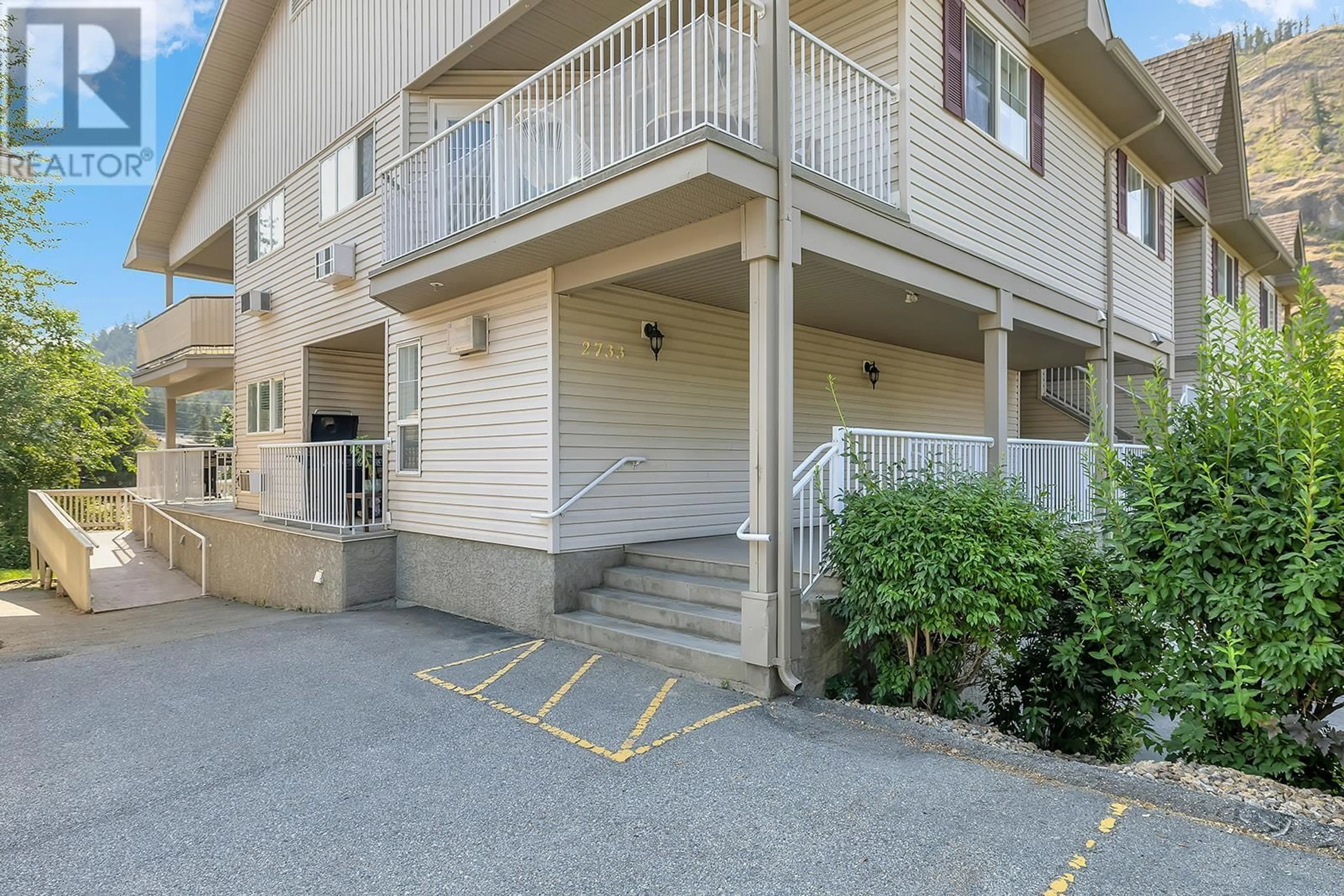 A pic from exterior of the house or condo, the front or back of building for 2733 Riffington Place Unit# 101, West Kelowna British Columbia V1Z3L1