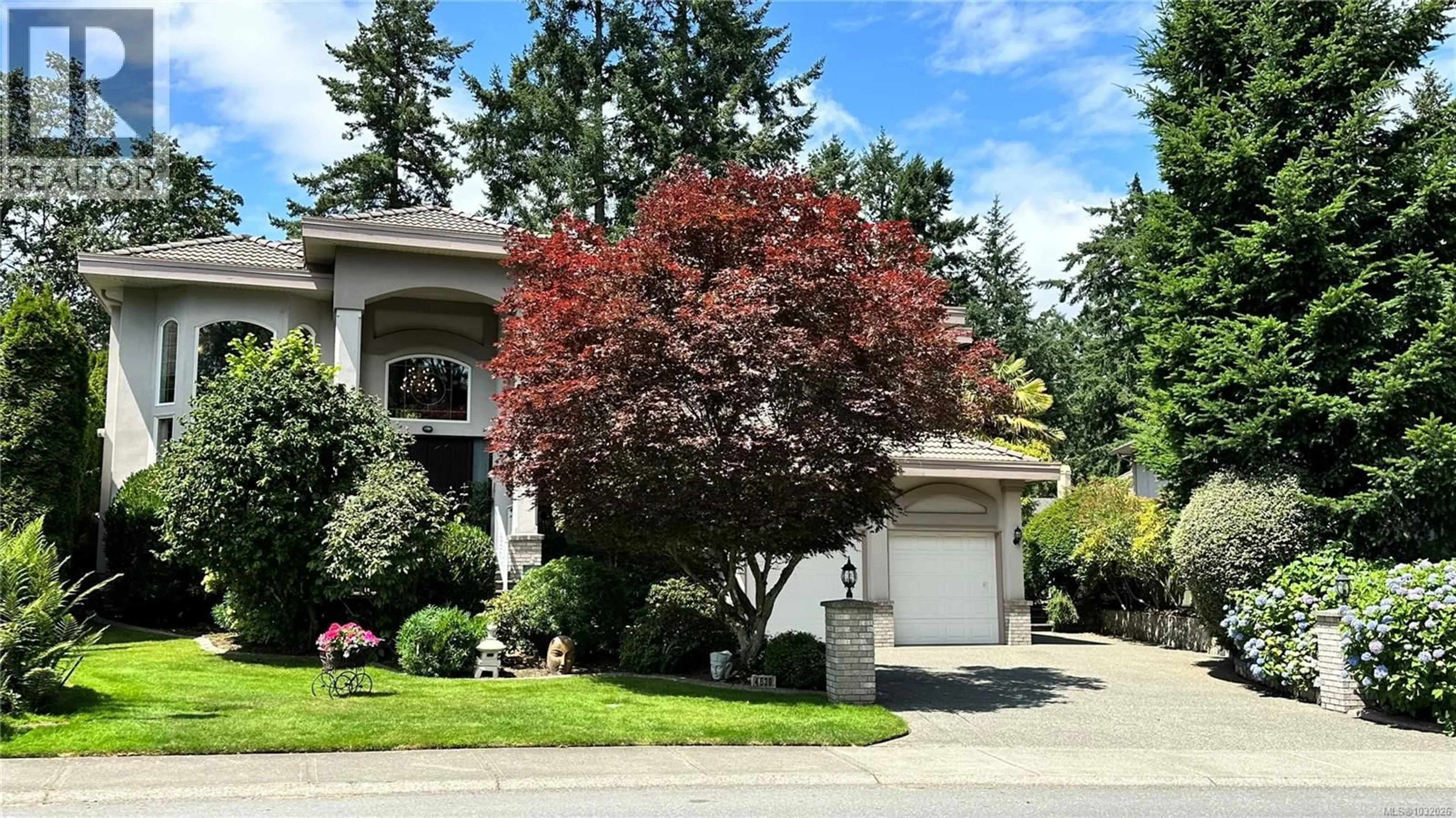 Home with vinyl exterior material, street for 4638 BOULDERWOOD DRIVE, Saanich British Columbia V8Y3G5