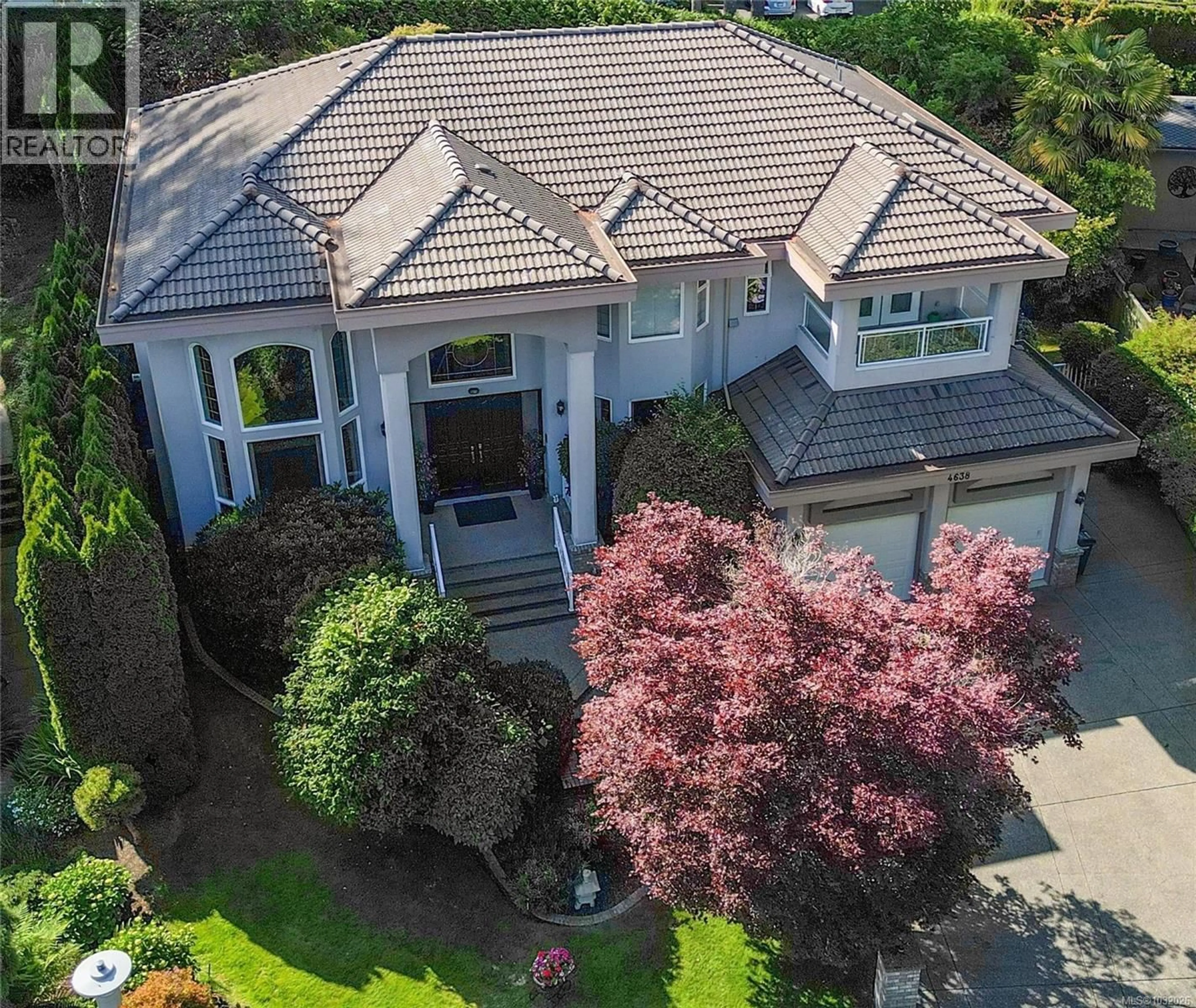 A pic from outside/outdoor area/front of a property/back of a property/a pic from drone, street for 4638 BOULDERWOOD DRIVE, Saanich British Columbia V8Y3G5