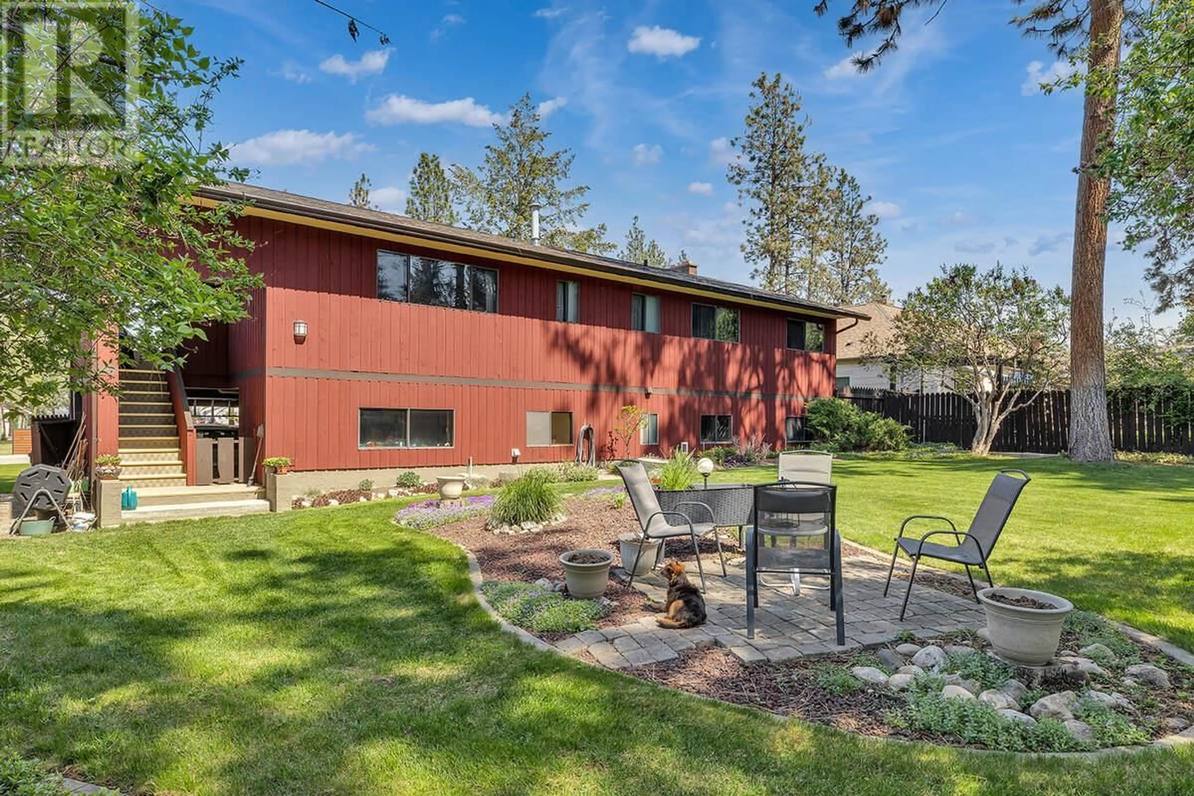 Patio, the fenced backyard for 655 Barnaby Road, Kelowna British Columbia V1W4N8