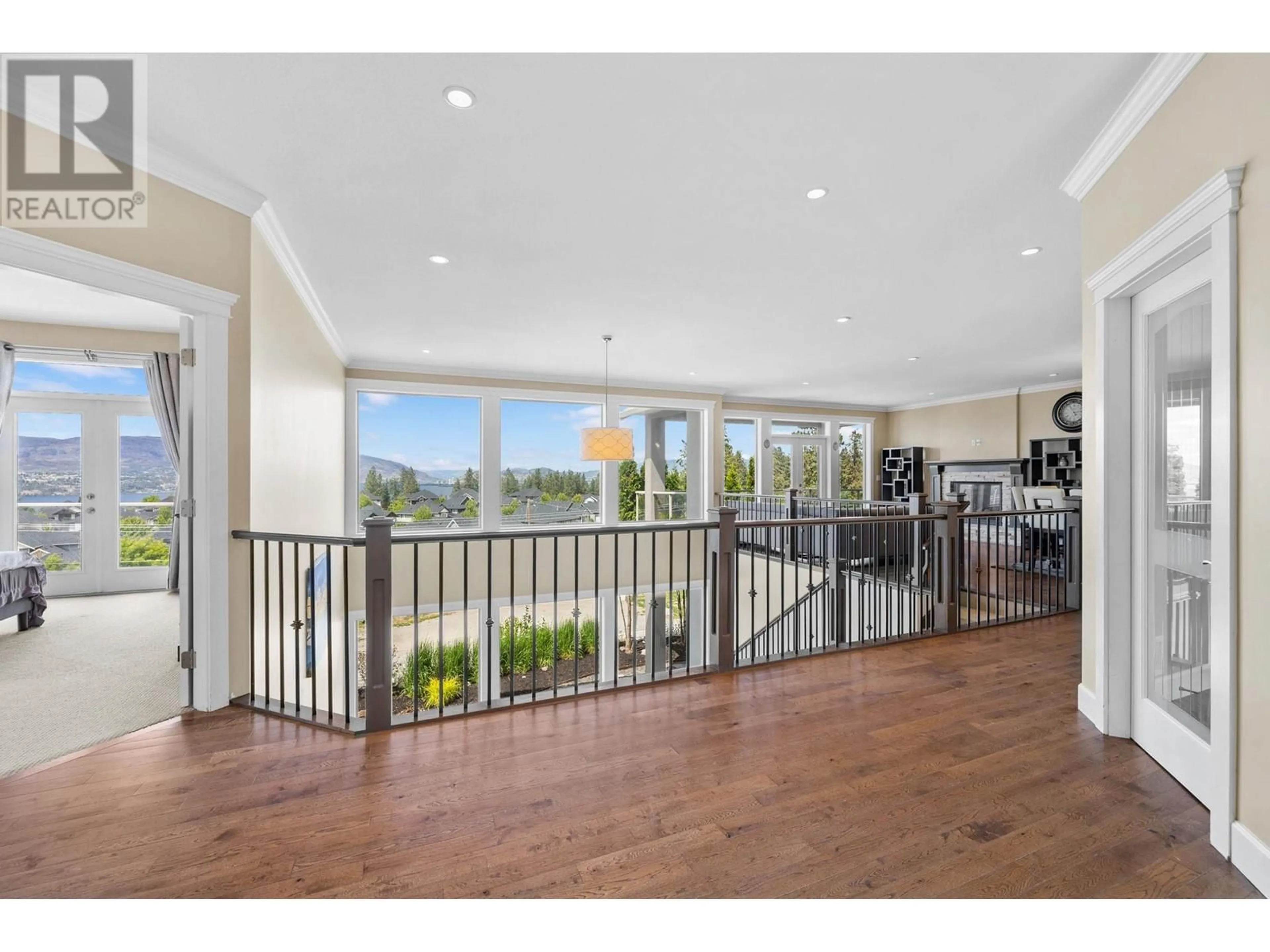 Indoor foyer, wood floors for 368 Trumpeter Court, Kelowna British Columbia V1W5J4