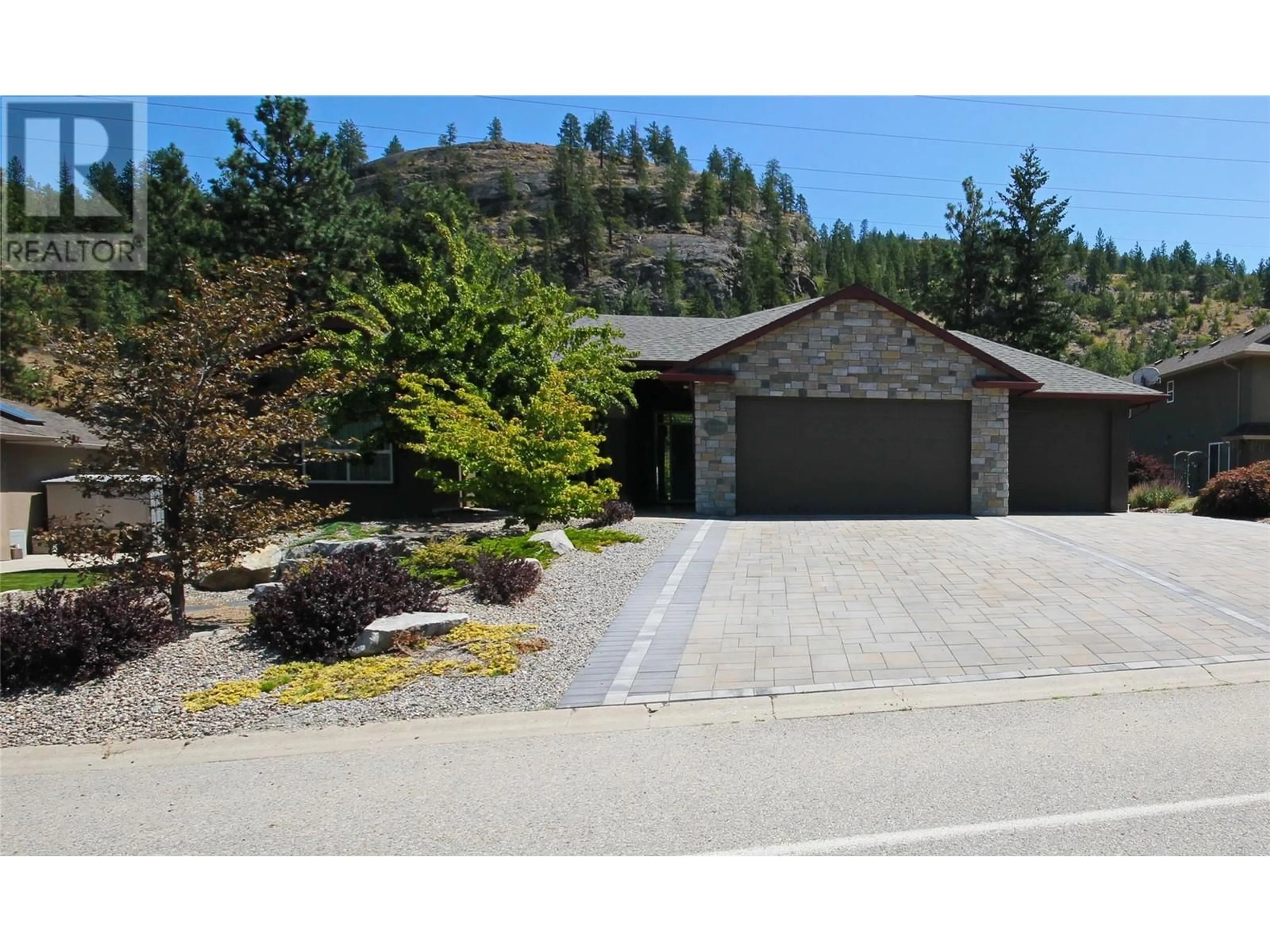 Frontside or backside of a home, the street view for 3160 EVERGREEN Drive, Penticton British Columbia V2A9A9