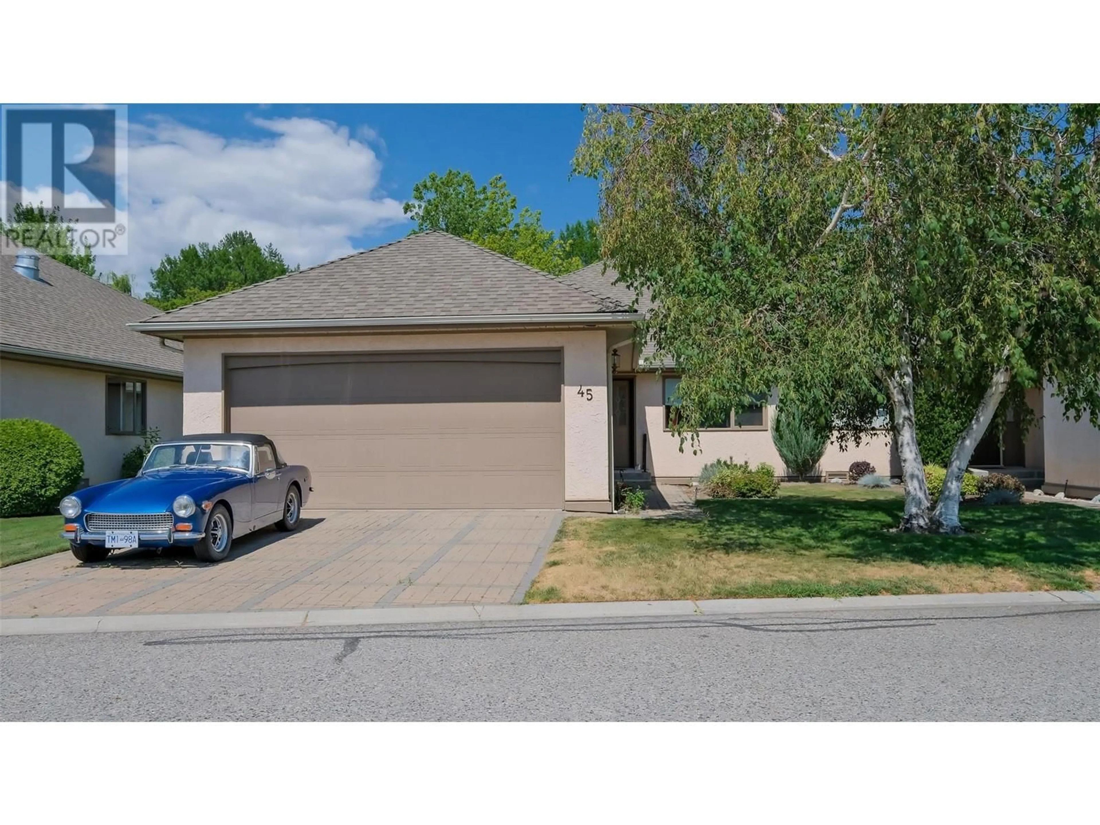 Frontside or backside of a home, the street view for 950 Lanfranco Road Unit# 45, Kelowna British Columbia V1W3X3