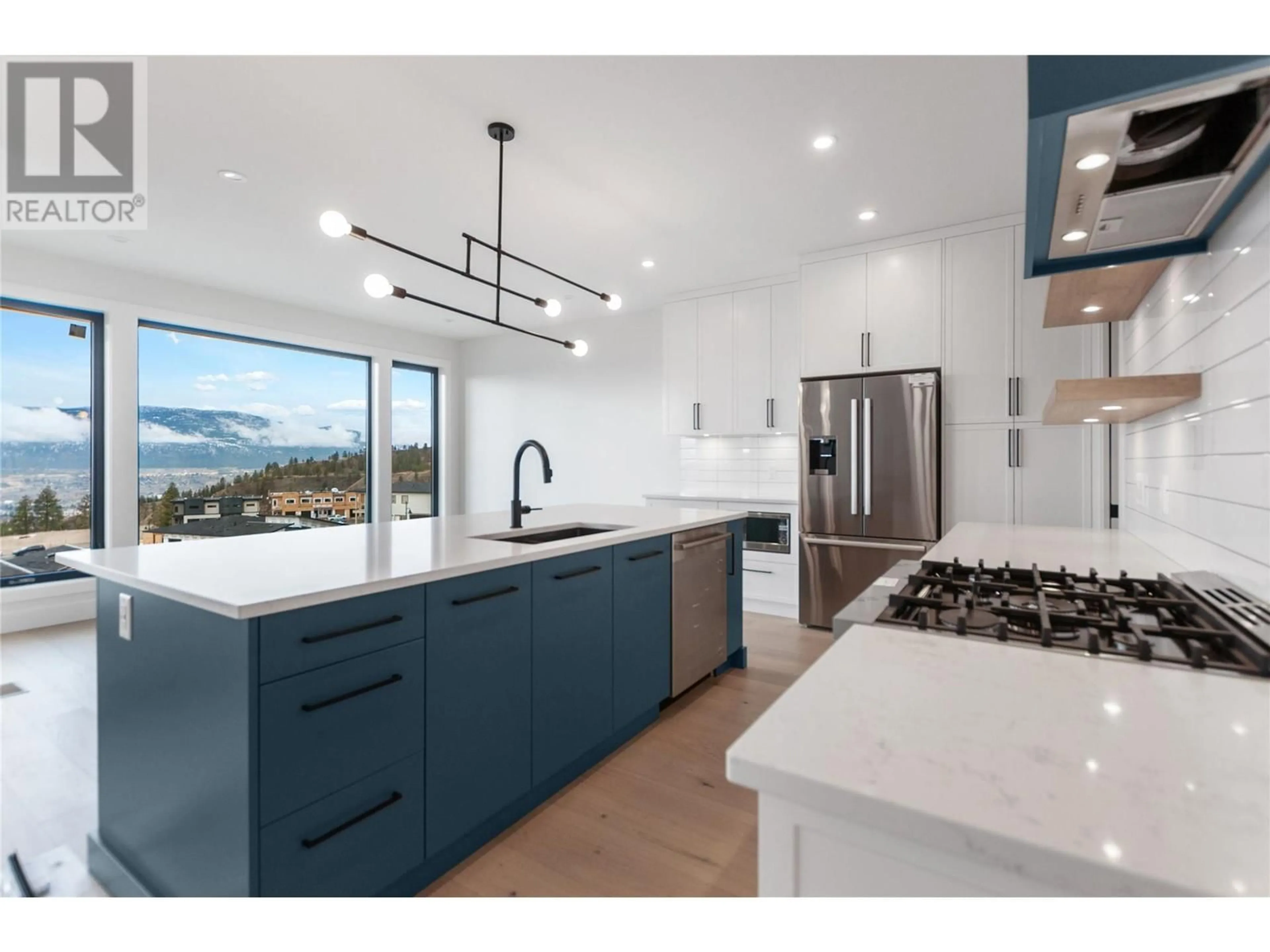 Open concept kitchen for 1135 Elk Street, Penticton British Columbia V2A0C9