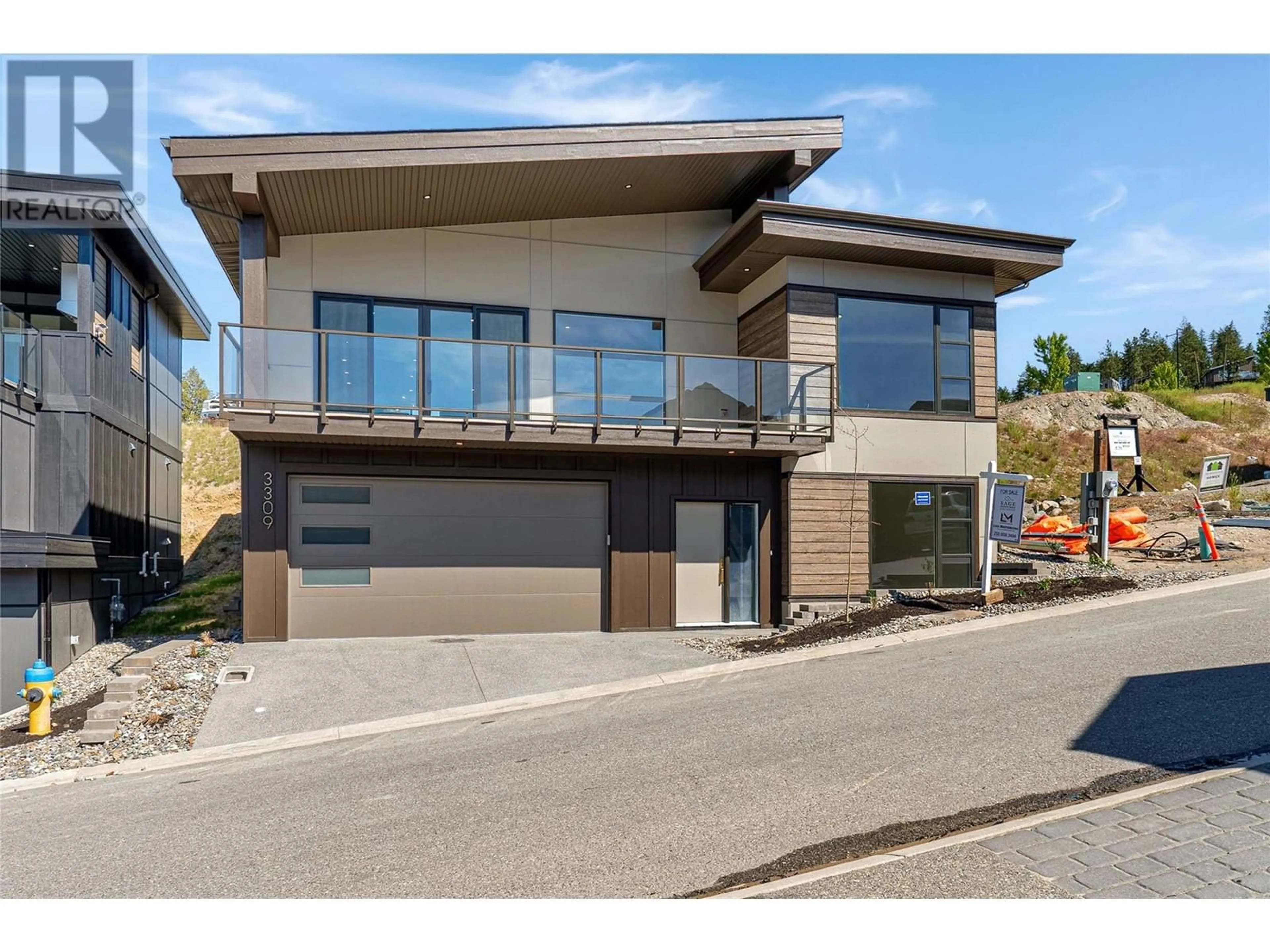 Frontside or backside of a home, the street view for 3309 Aspen Lane, Kelowna British Columbia V1V0C6