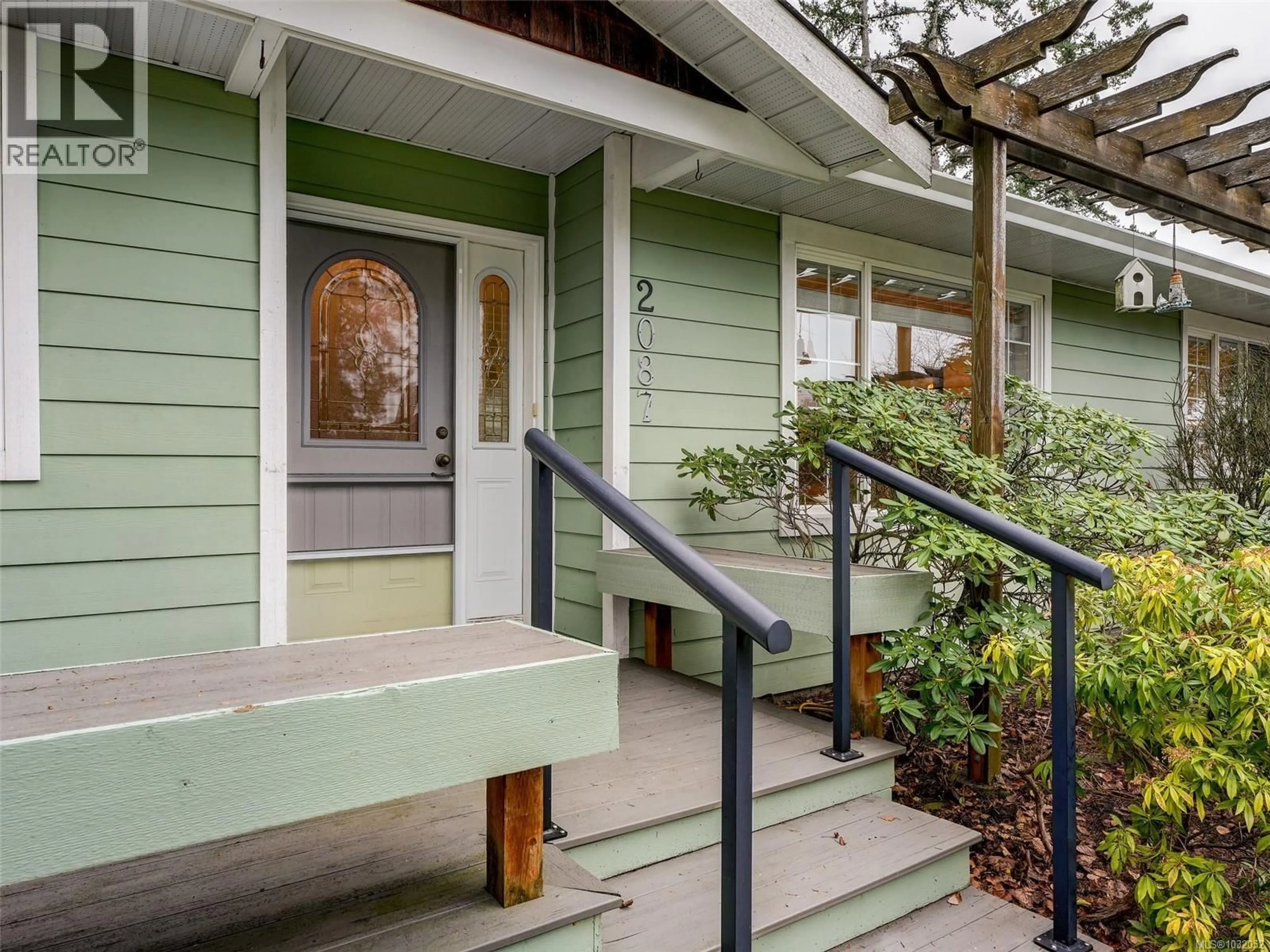 Home with vinyl exterior material, street for 2087 JAMES WHITE BOULEVARD, Sidney British Columbia V8L4G5