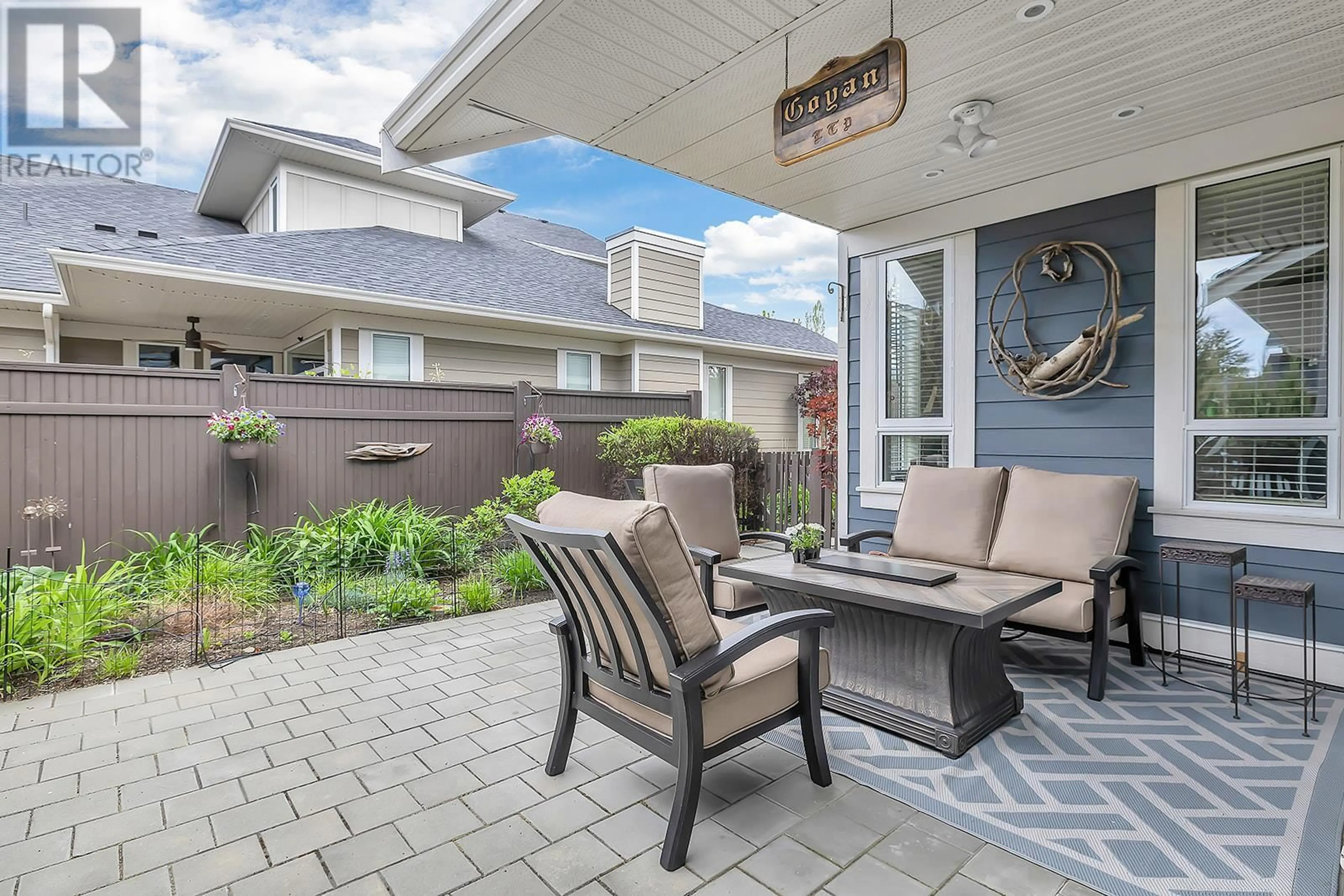 Patio, the fenced backyard for 1960 KLO Road Unit# 20, Kelowna British Columbia V1W5L2