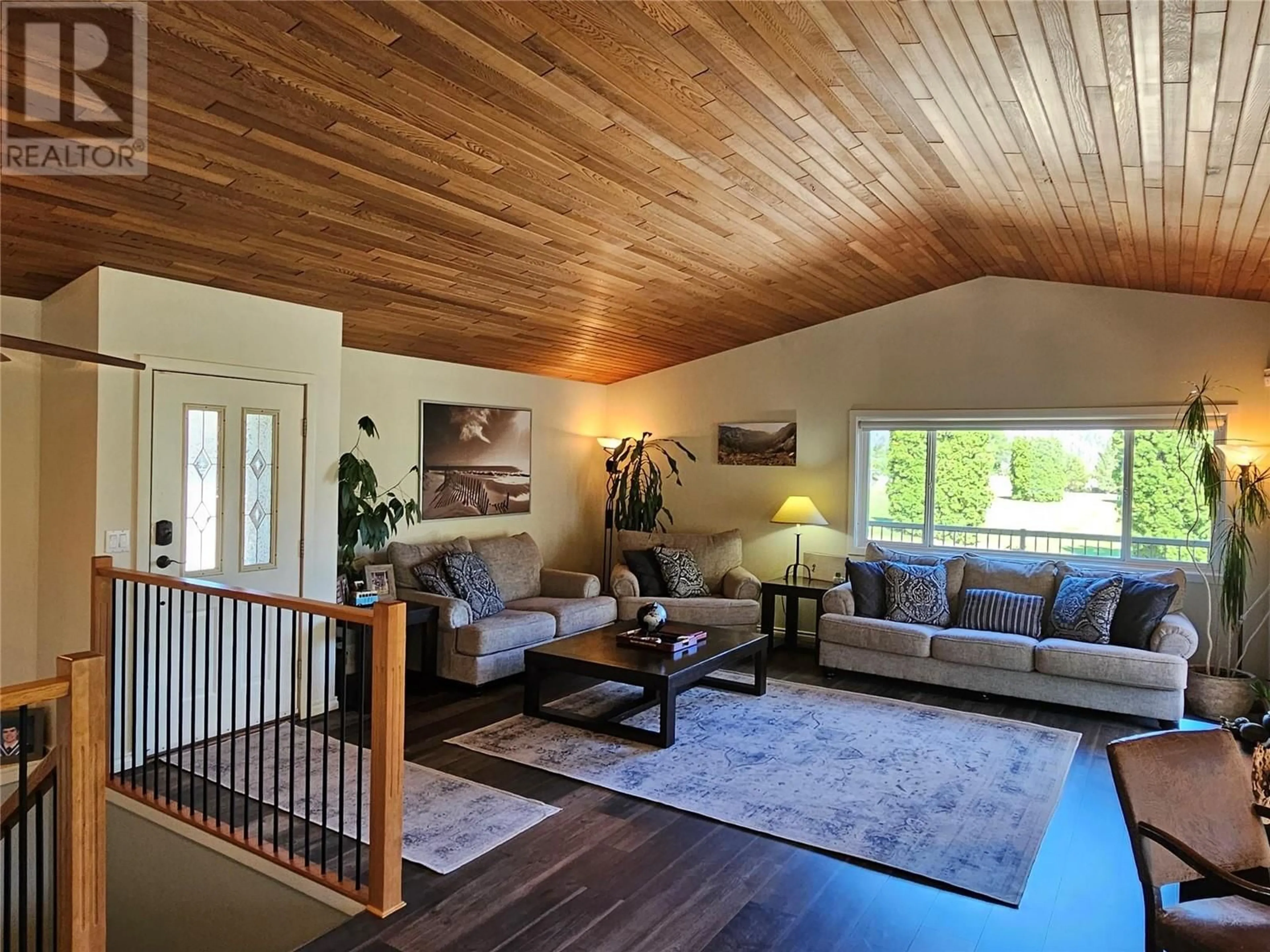 Living room with furniture, wood/laminate floor for 429 3RD AVENUE, Keremeos British Columbia V0X1N2