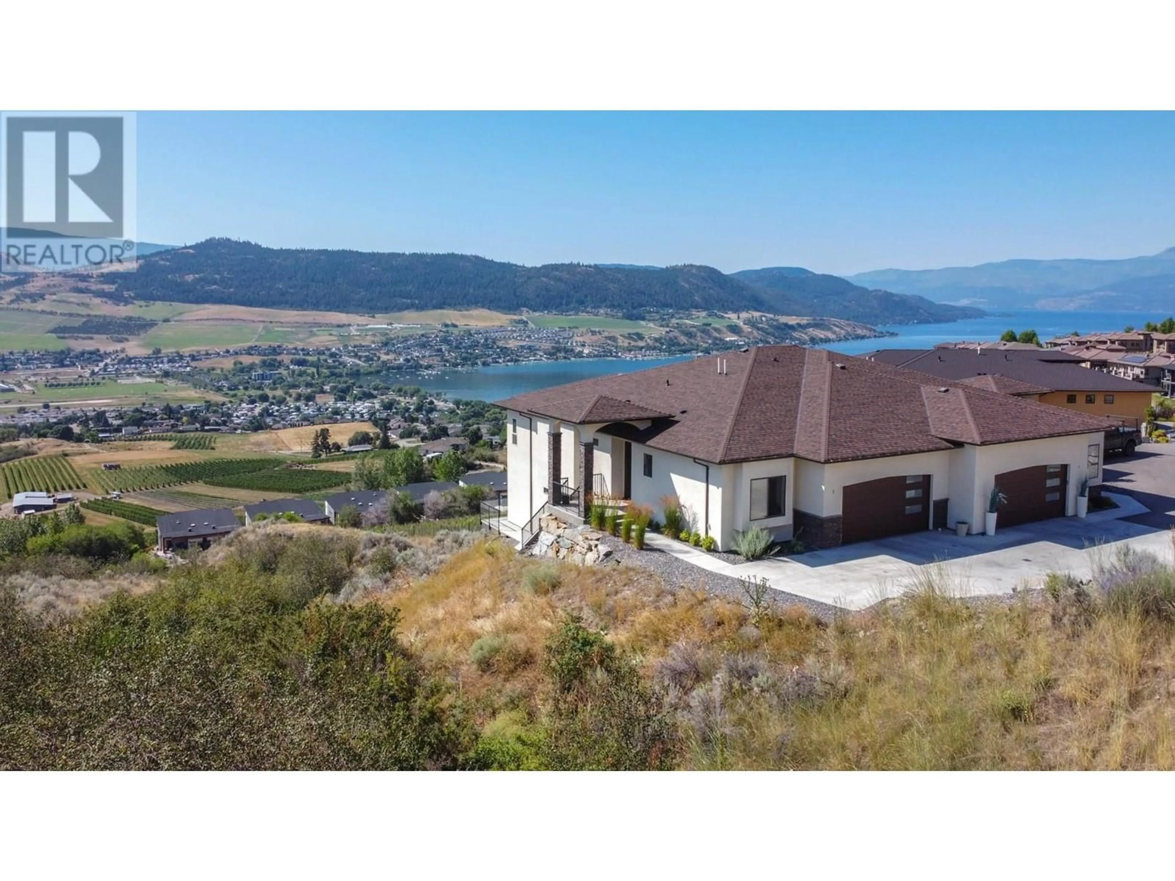 Frontside or backside of a home for 7716 Okanagan Hills Boulevard Unit# 2, Vernon British Columbia V1H1Z9