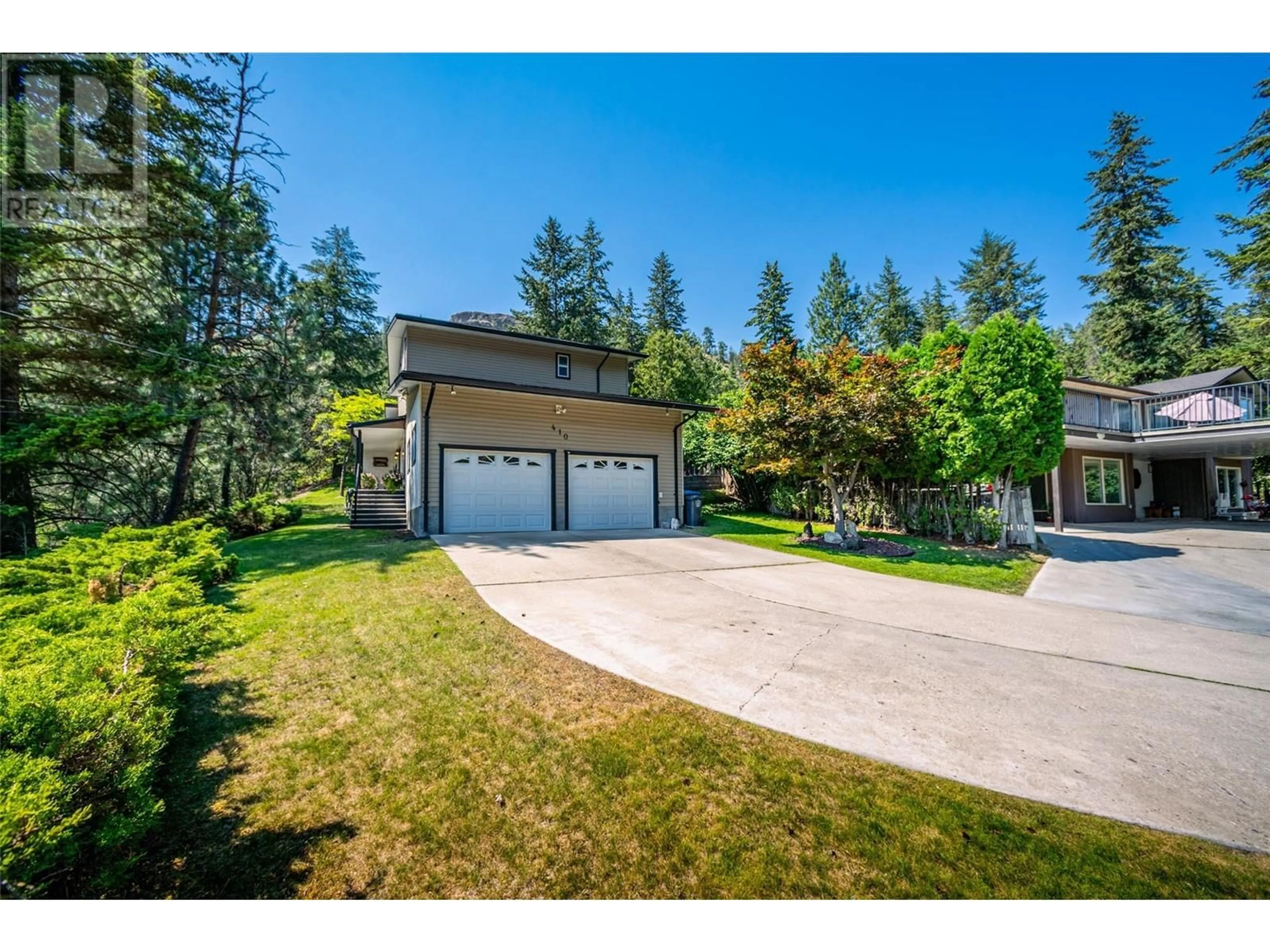 Frontside or backside of a home, cottage for 410 Clifton Road, Kelowna British Columbia V1V1A5