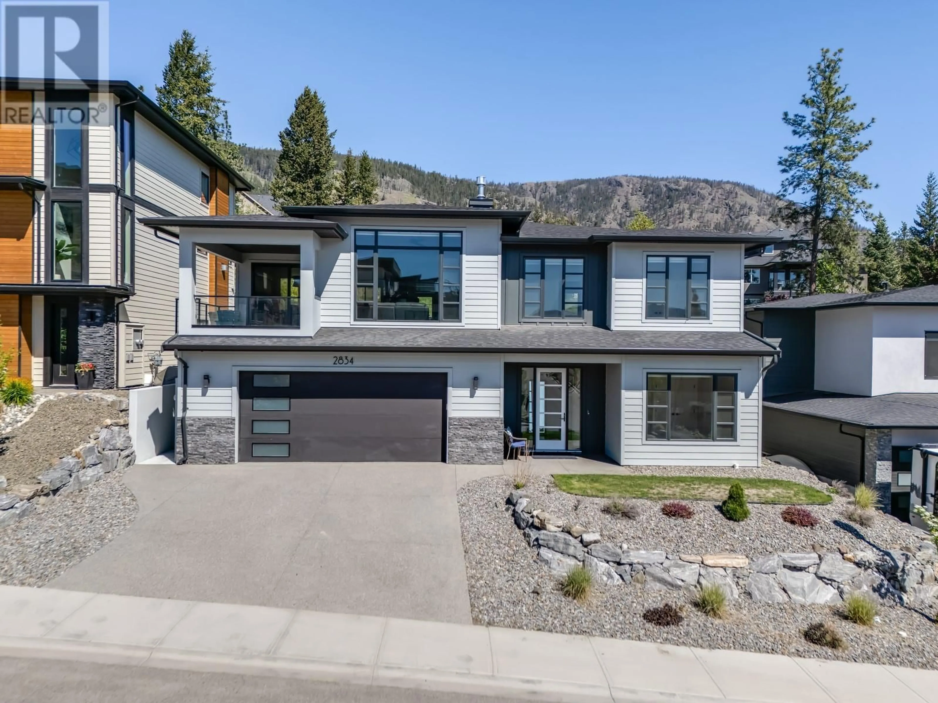 Home with brick exterior material, mountain view for 2834 CANYON CREST DRIVE, West Kelowna British Columbia V4T0E3