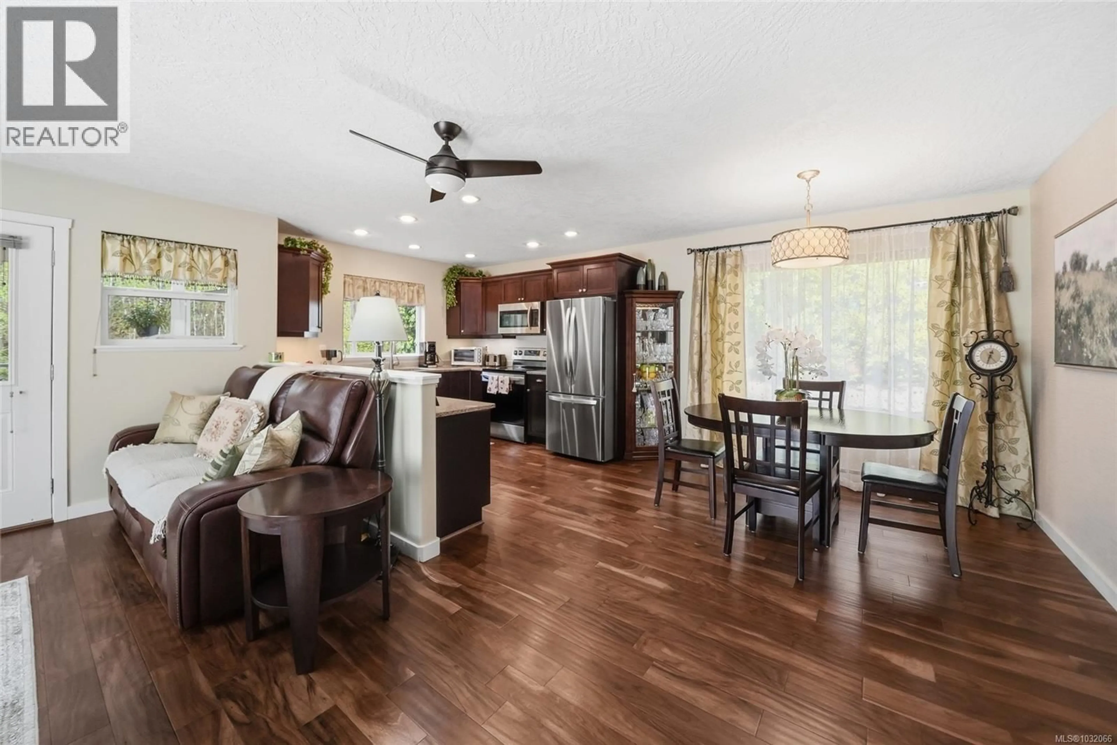 Open concept kitchen, wood/laminate floor for 1688 LAILAH'S LOOP, Qualicum Beach British Columbia V9K2S3