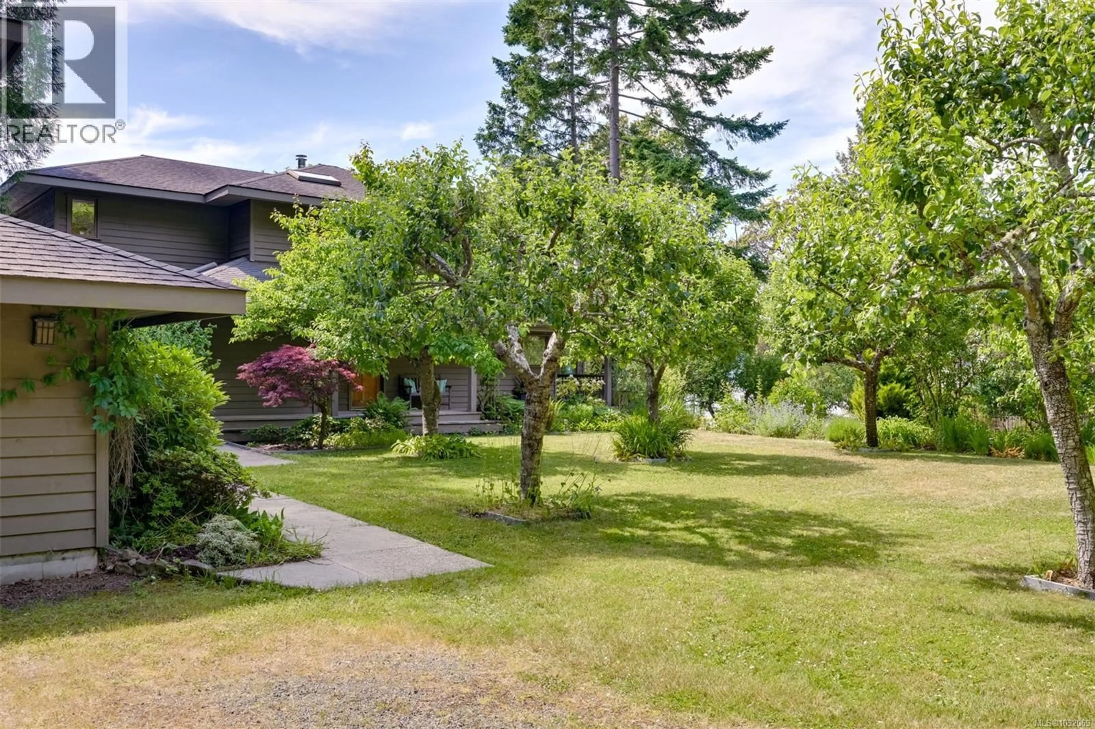 A pic from outside/outdoor area/front of a property/back of a property/a pic from drone, unknown for 114 ARBUTUS ROAD, Salt Spring British Columbia V8K1A3