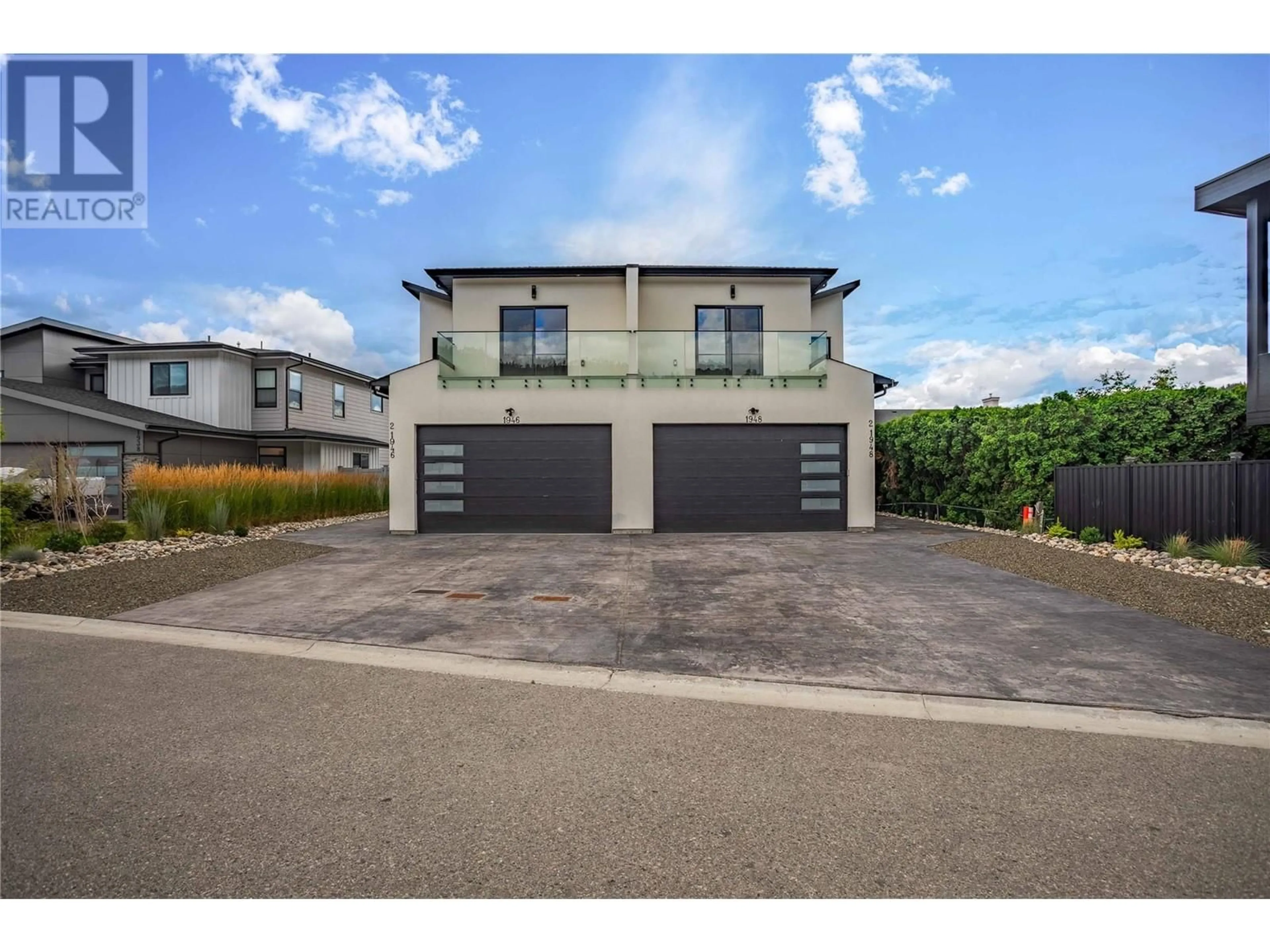 Frontside or backside of a home, the street view for 1948 Hemmerling Court, Kelowna British Columbia V1V1X1