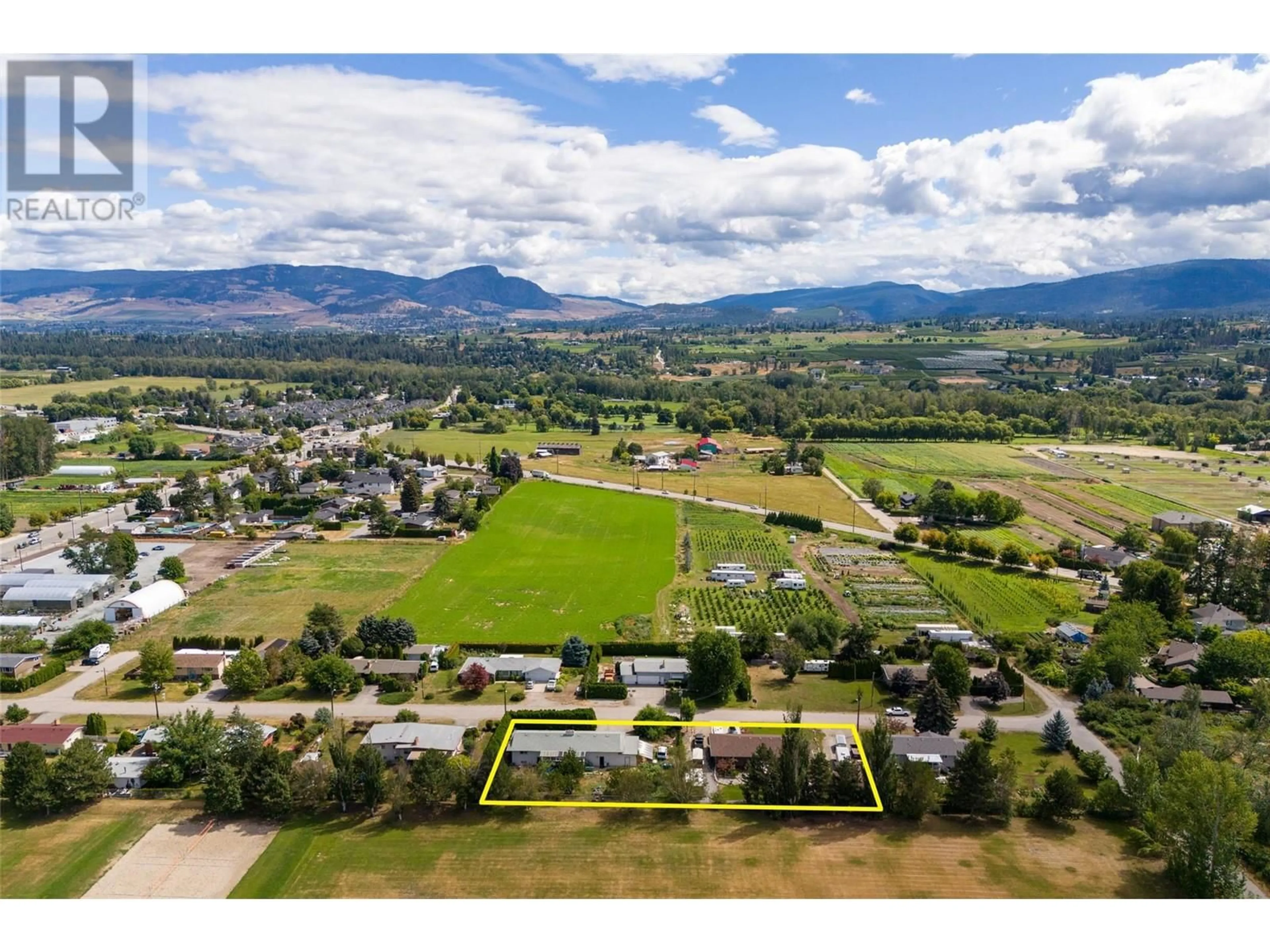 A pic from outside/outdoor area/front of a property/back of a property/a pic from drone, mountain view for 3250 ST. AMAND ROAD, Kelowna British Columbia V1W3P1