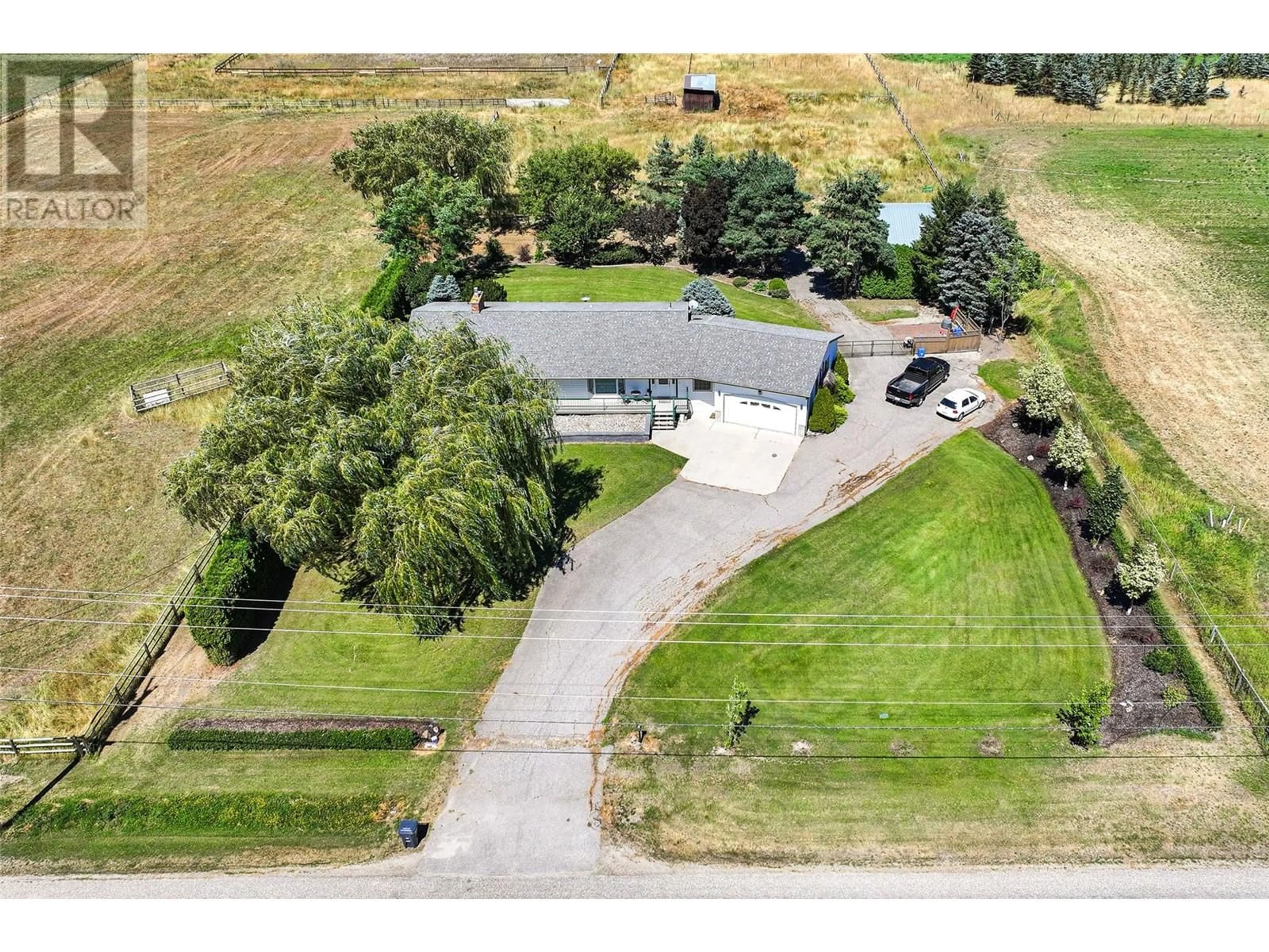 A pic from outside/outdoor area/front of a property/back of a property/a pic from drone, unknown for 1176 THOMAS-HAYES ROAD, Spallumcheen British Columbia V4Y0N7