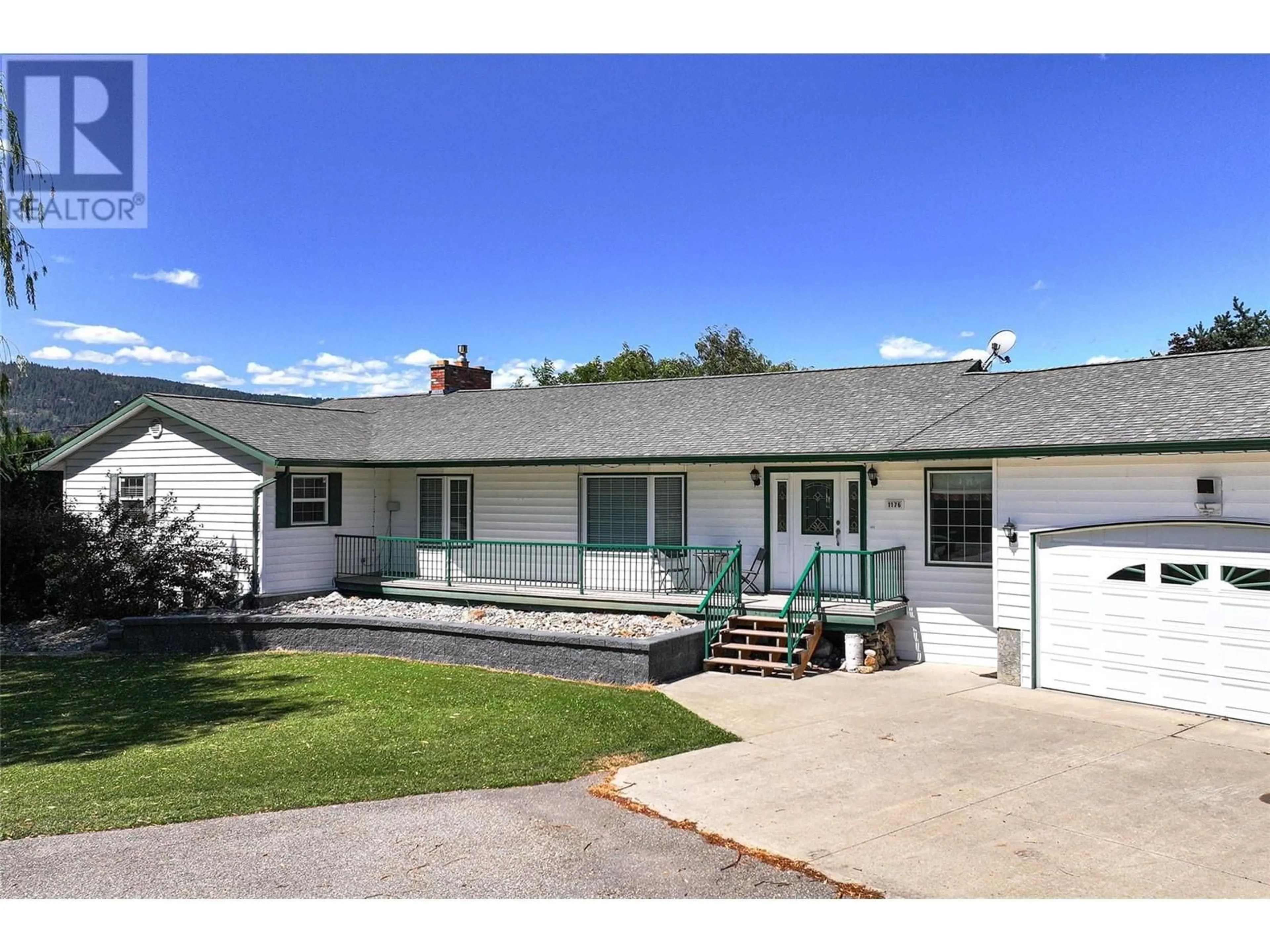 Home with vinyl exterior material, street for 1176 THOMAS-HAYES ROAD, Spallumcheen British Columbia V4Y0N7