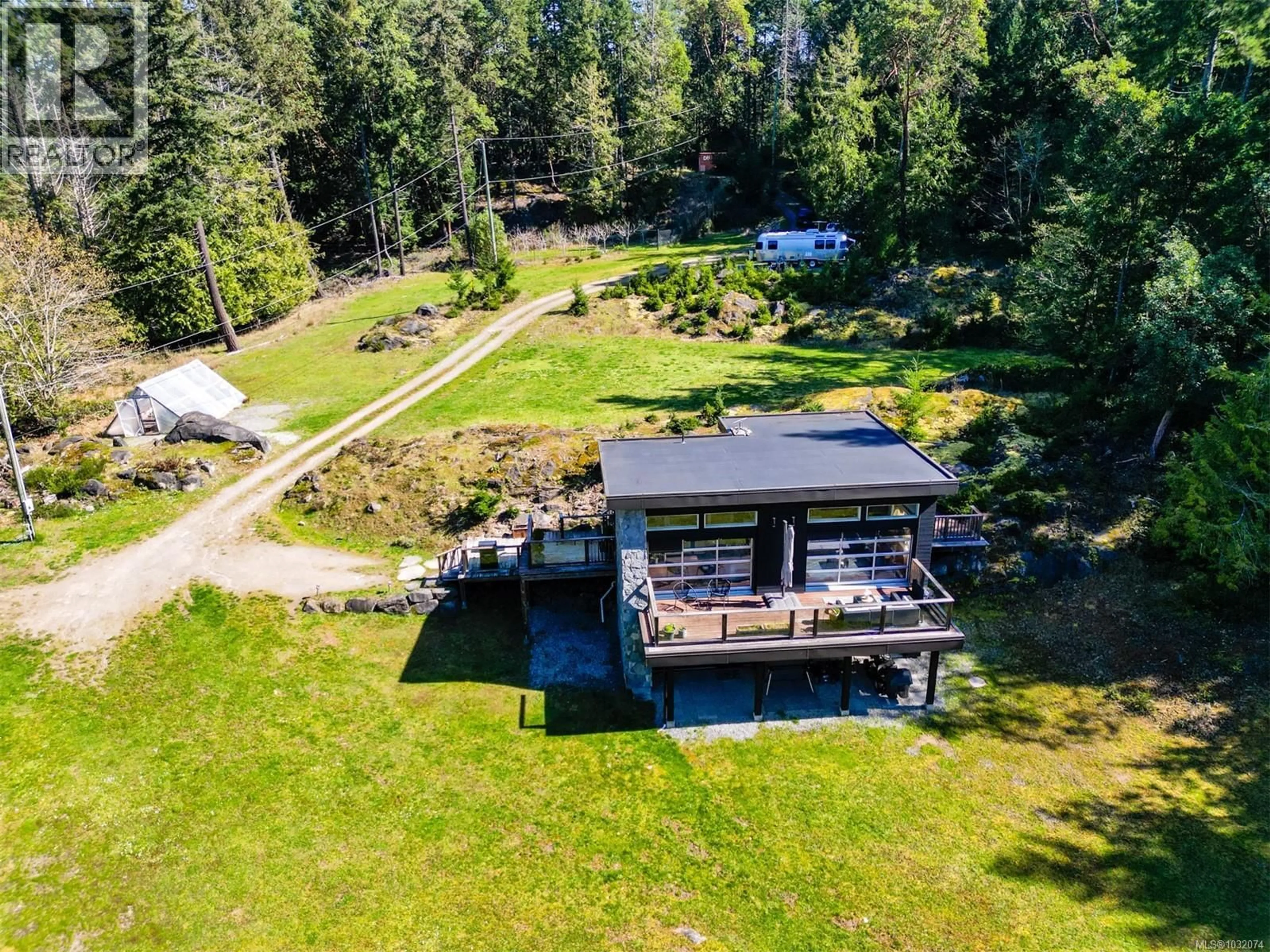 A pic from outside/outdoor area/front of a property/back of a property/a pic from drone, water/lake/river/ocean view for 5582 HOOSON ROAD, Pender Island British Columbia V0N2M1