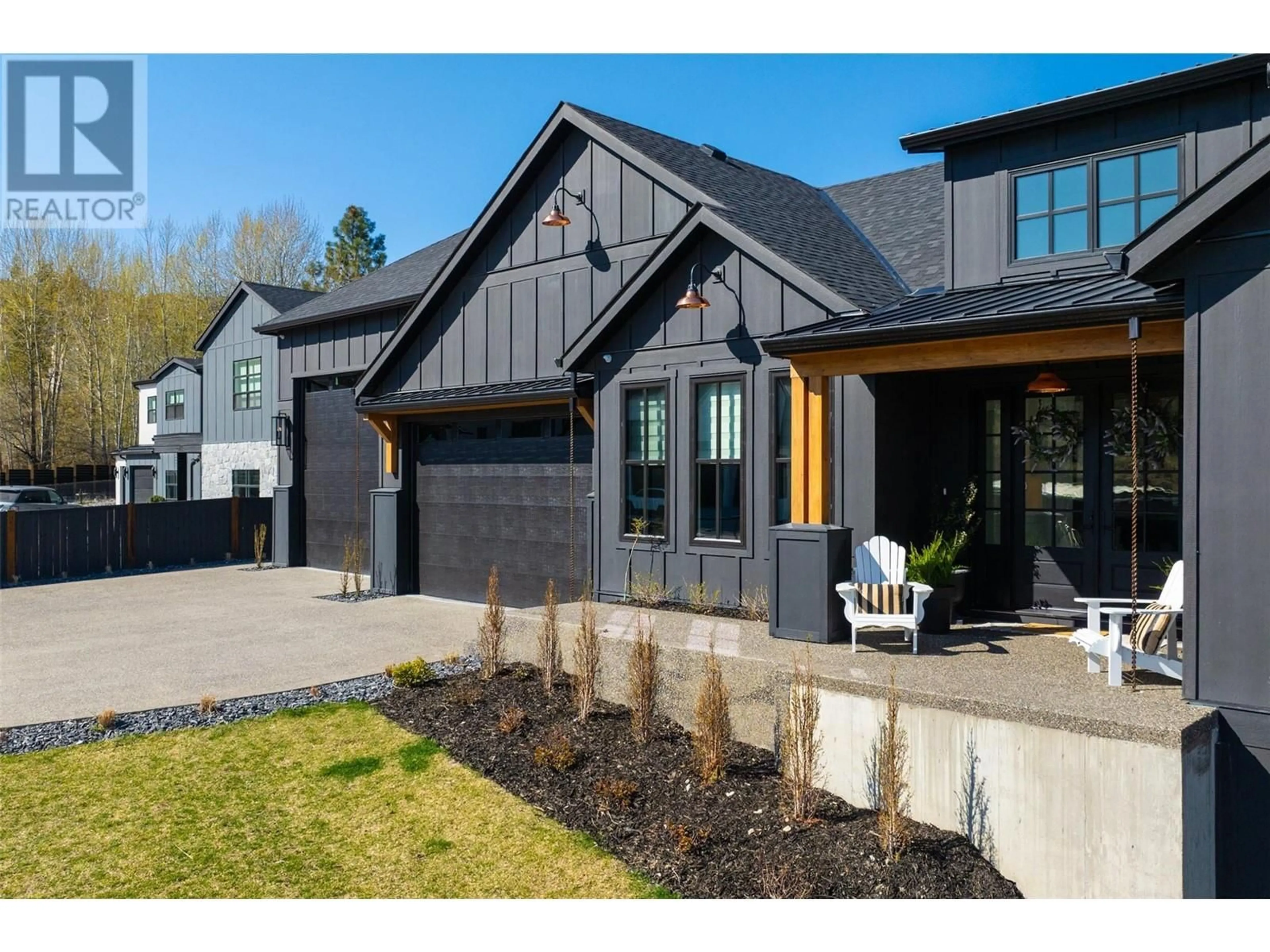 Home with brick exterior material, street for 652 TRUMPETER ROAD, Kelowna British Columbia V1W4L6
