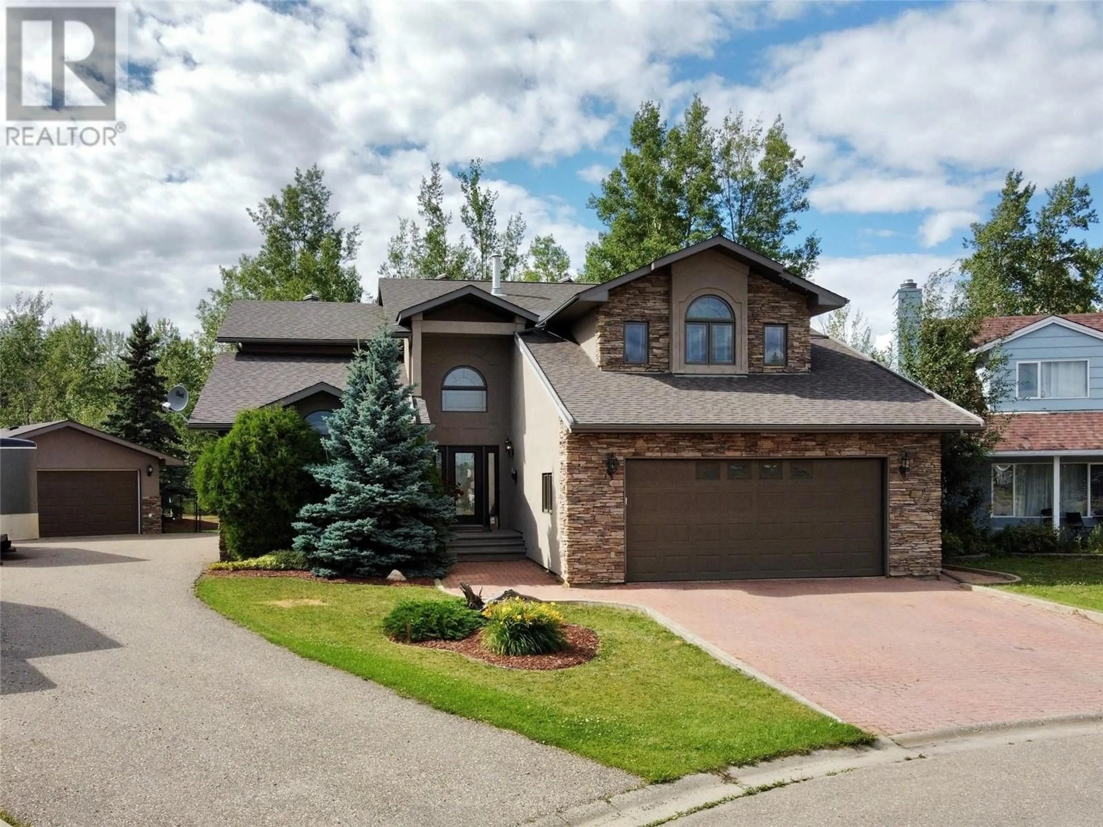 Frontside or backside of a home, cottage for 10701 Pinecrest Lane, Dawson Creek British Columbia V1G4M6