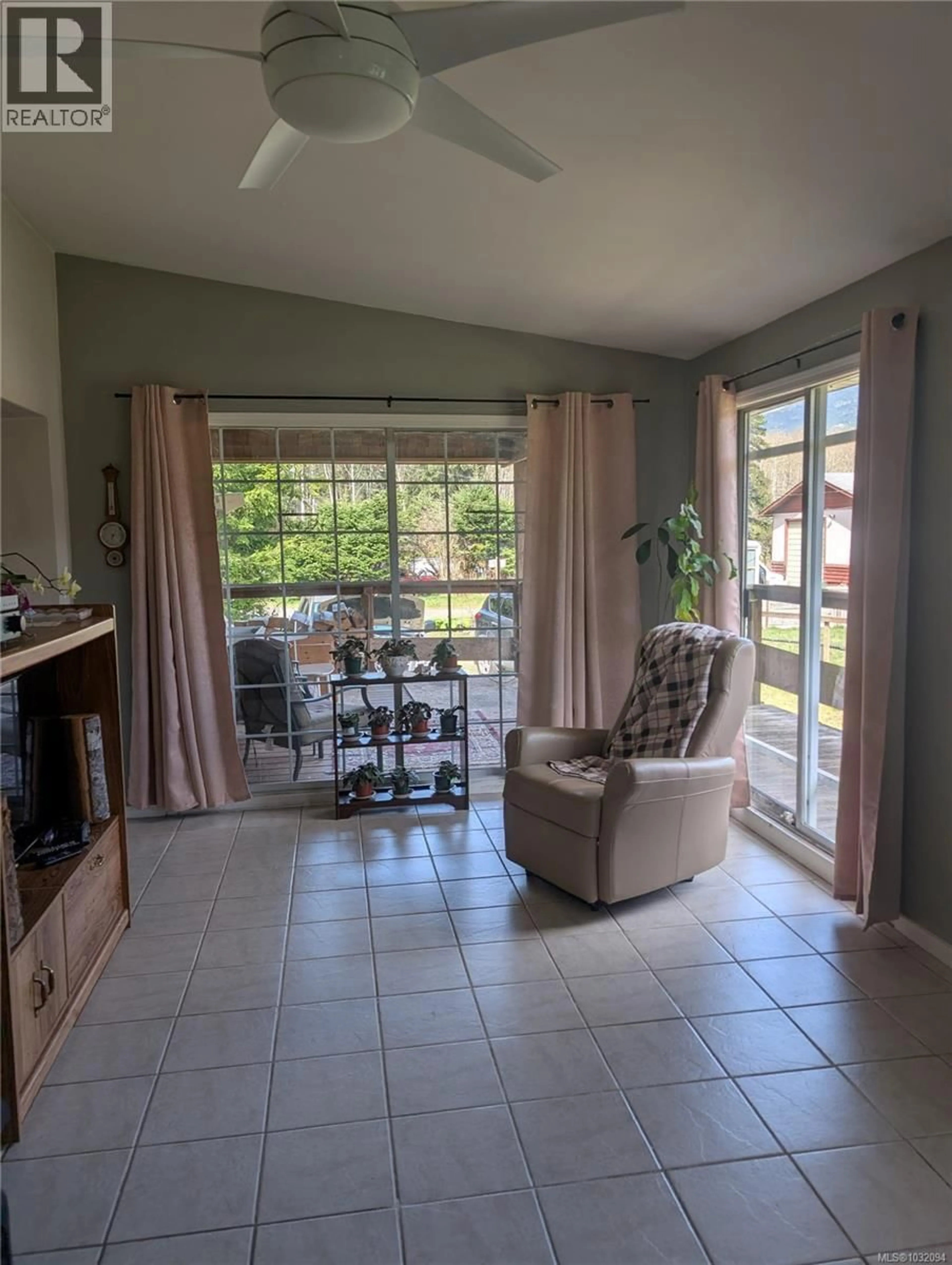 Living room with furniture, ceramic/tile floor for 1430 PHYE PLACE, Sayward British Columbia V0N1R0