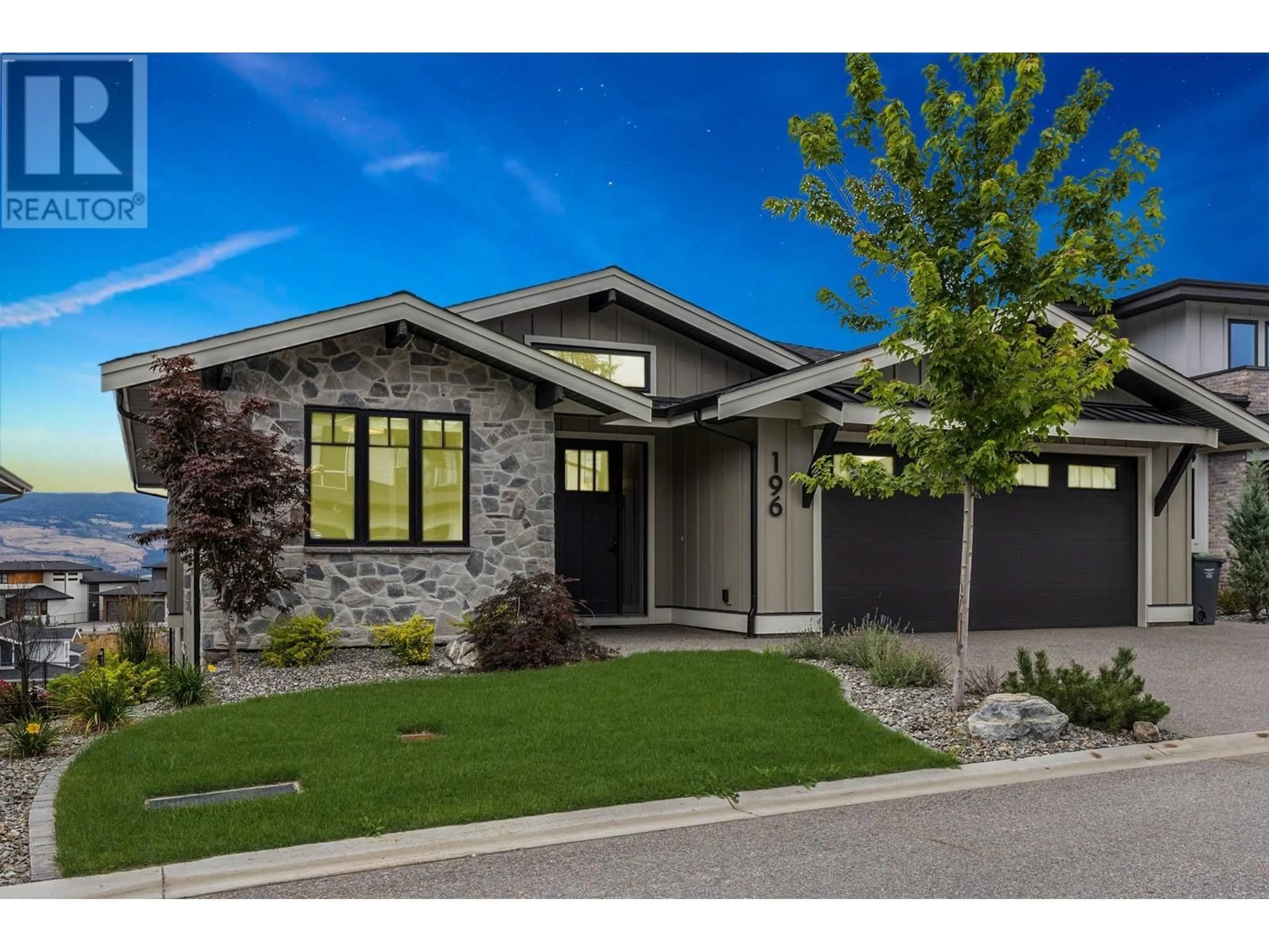 Home with brick exterior material for 196 Summer Wood Drive, Kelowna British Columbia V1V2Z9