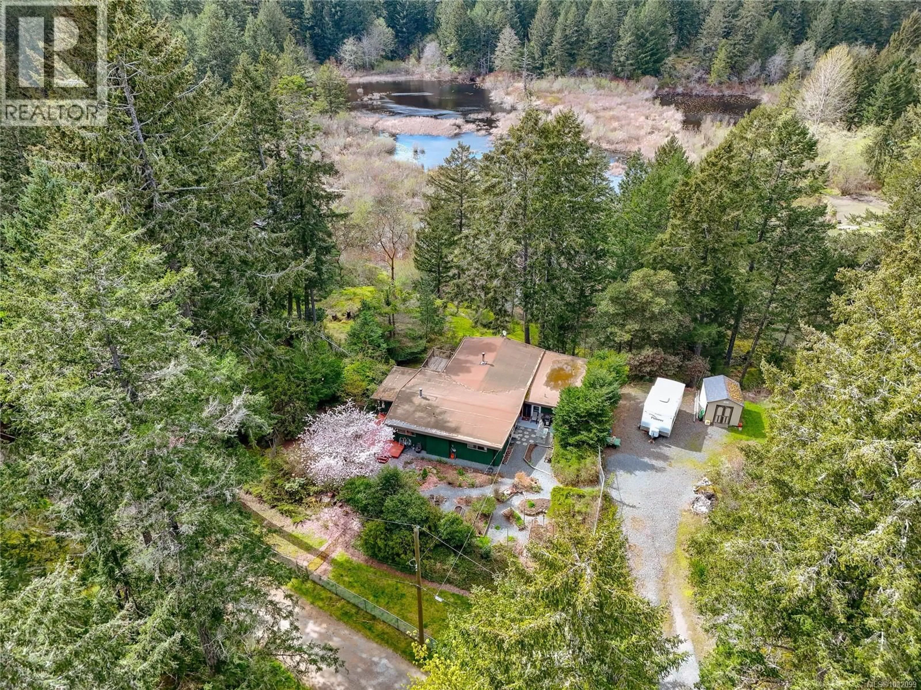 A pic from outside/outdoor area/front of a property/back of a property/a pic from drone, water/lake/river/ocean view for 2800 HERBATE ROAD, View Royal British Columbia V9B6J7