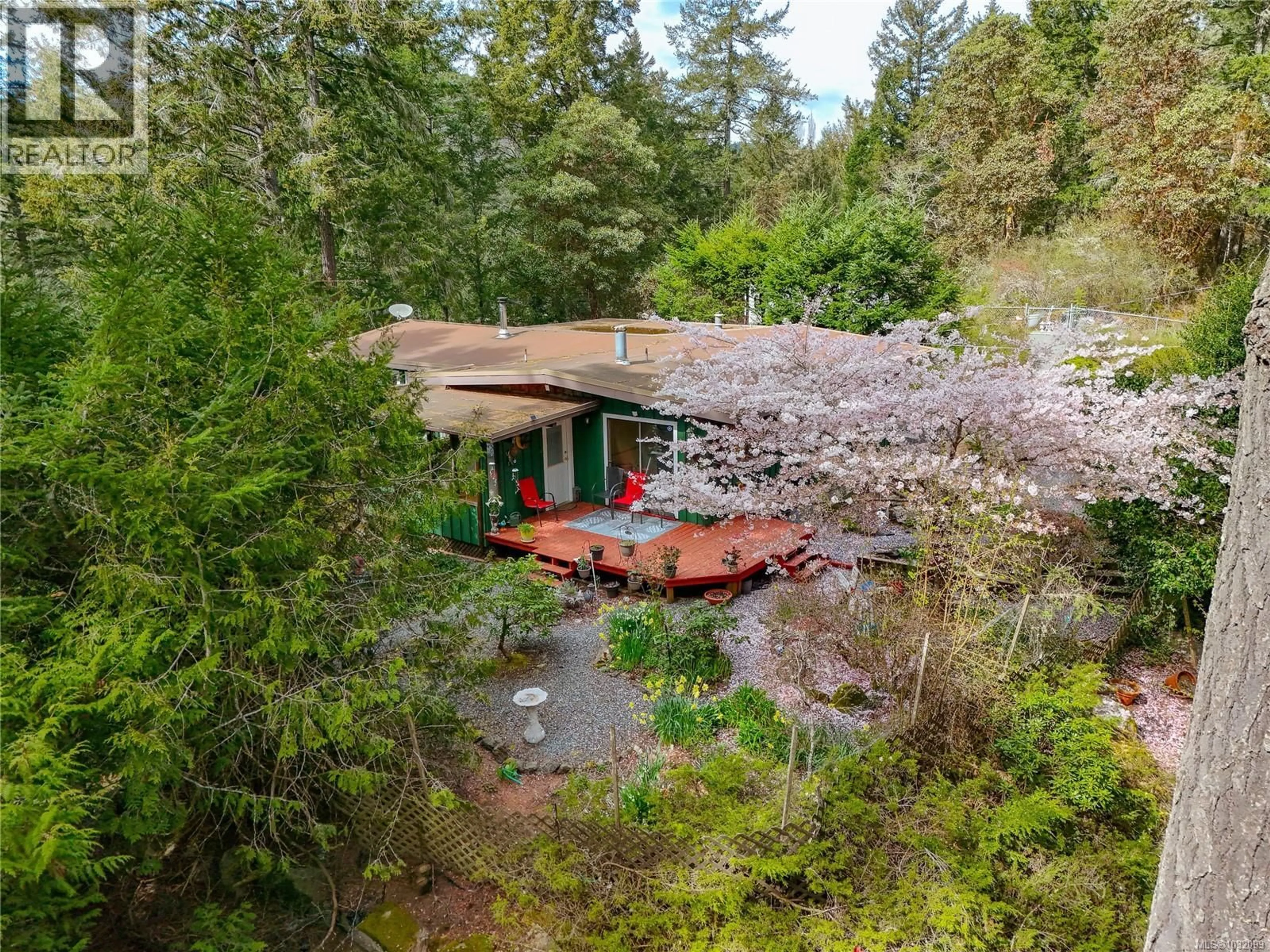 A pic from outside/outdoor area/front of a property/back of a property/a pic from drone, forest/trees view for 2800 HERBATE ROAD, View Royal British Columbia V9B6J7