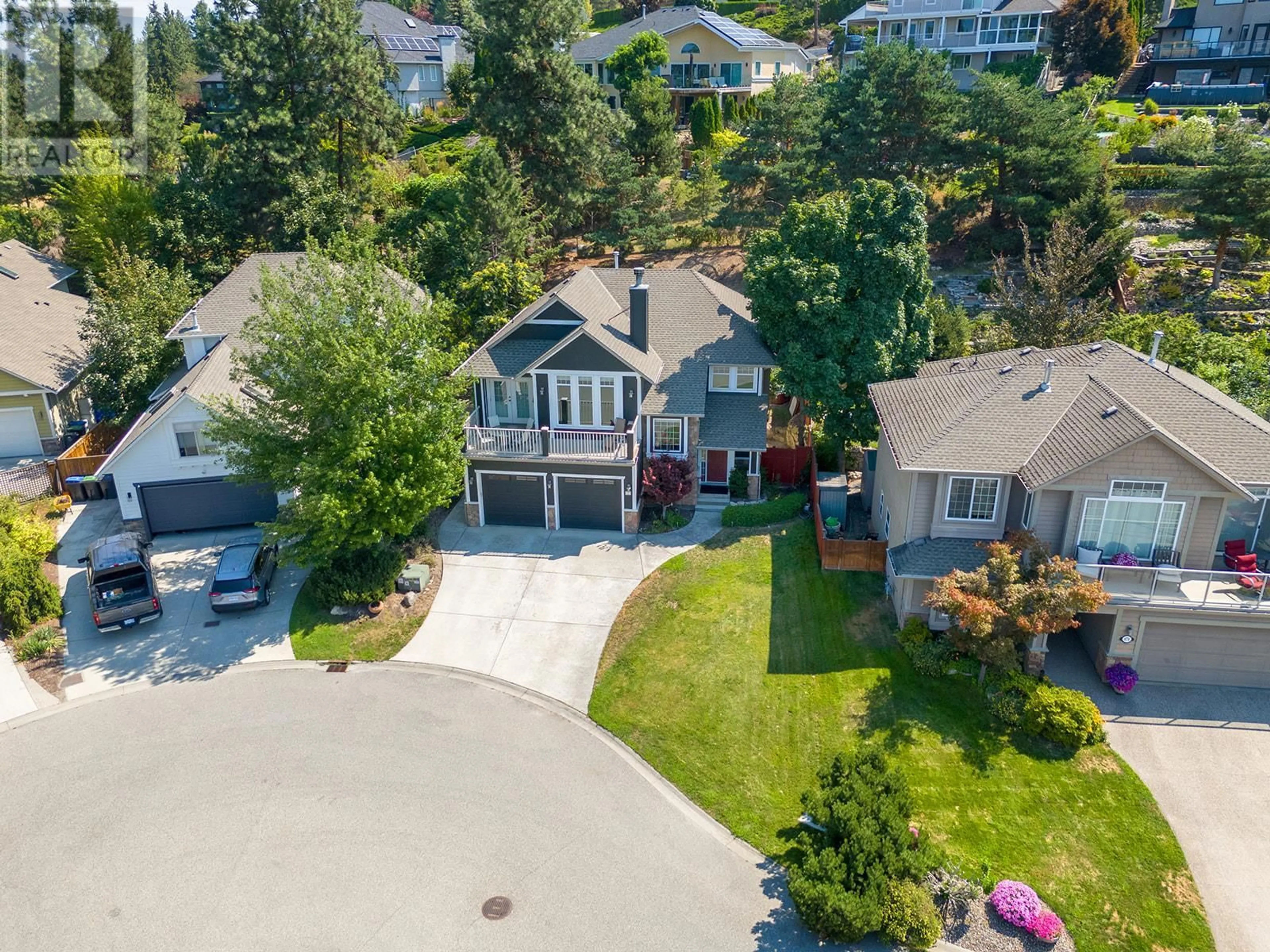 Frontside or backside of a home, the street view for 675 Westpoint Court, Kelowna British Columbia V1W4Y3