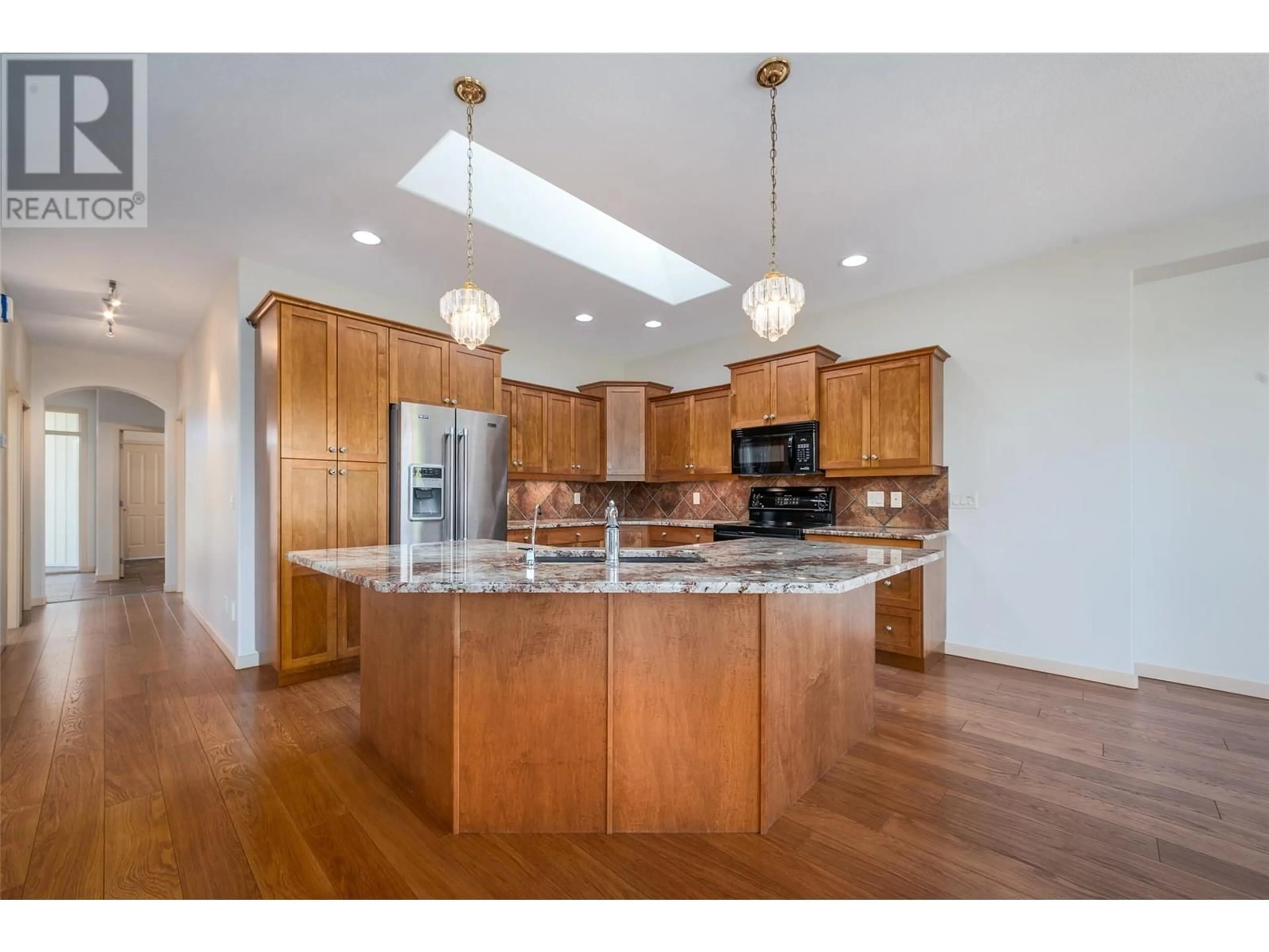 Open concept kitchen, unknown for 75 - 2365 STILLINGFLEET ROAD, Kelowna British Columbia V1W4X5
