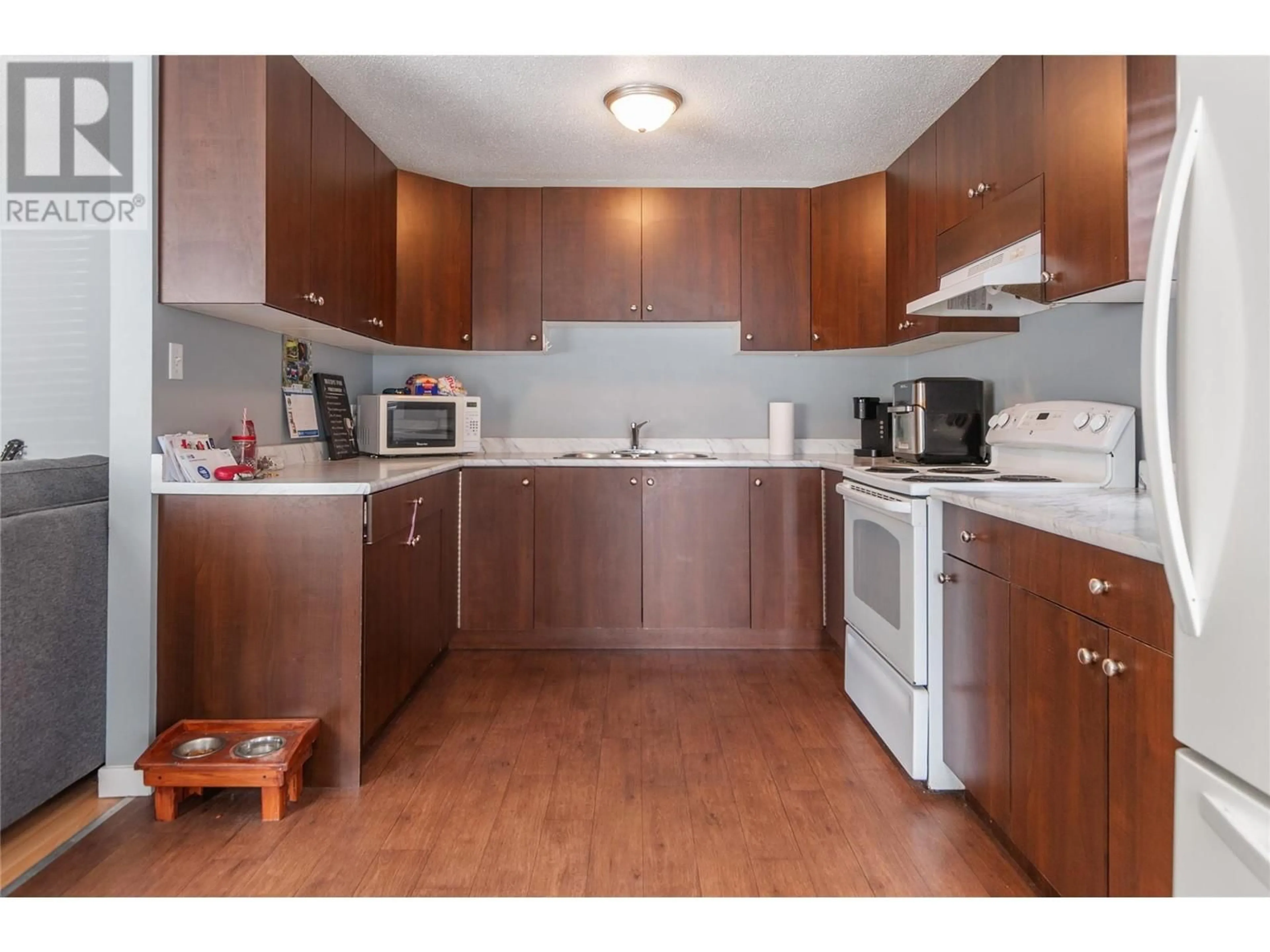 Standard kitchen, wood floors for 787 Kamloops Avenue, Penticton British Columbia V2A2J3