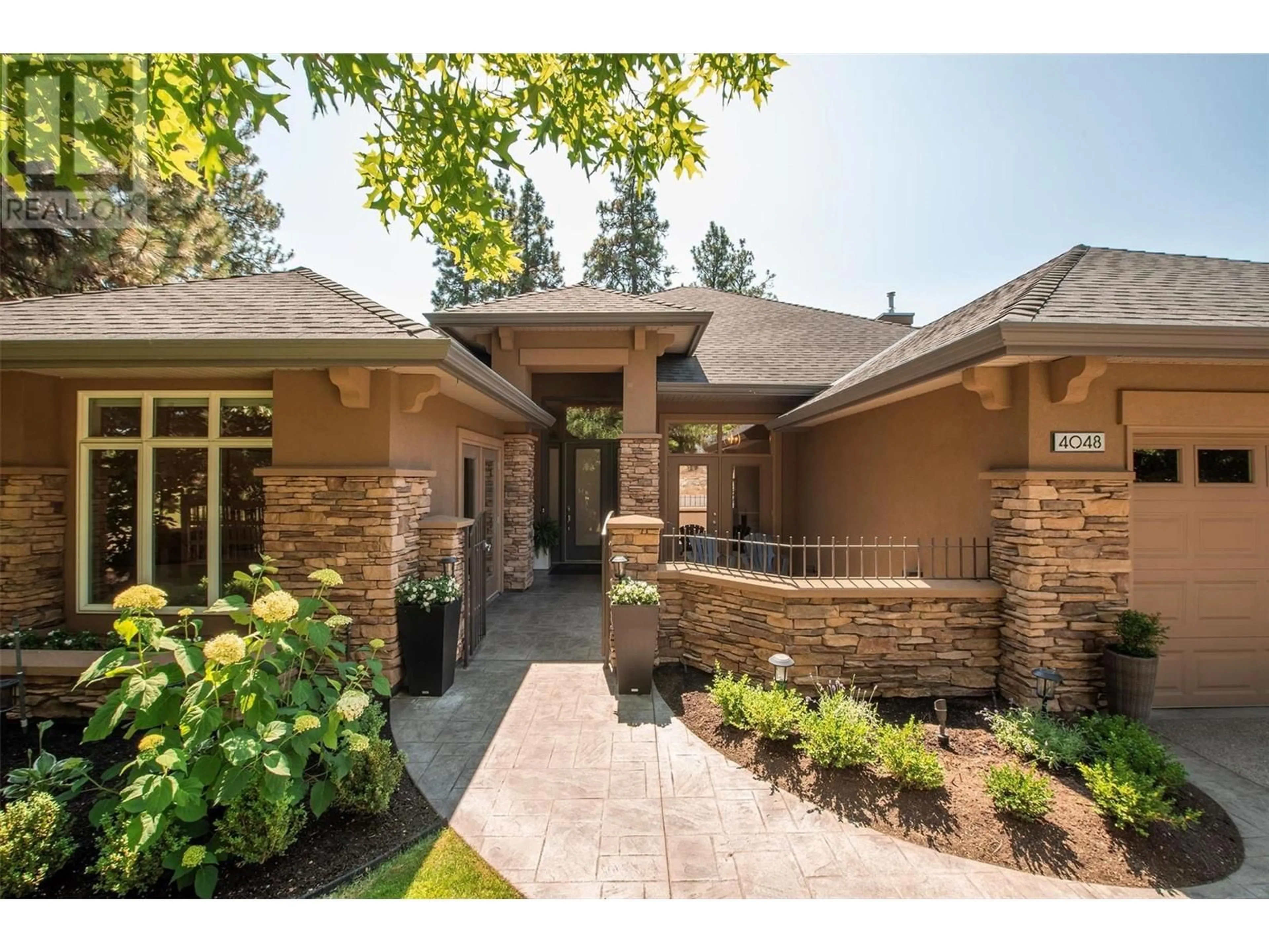 Frontside or backside of a home, cottage for 4048 Gallaghers Terrace, Kelowna British Columbia V1W3Z8