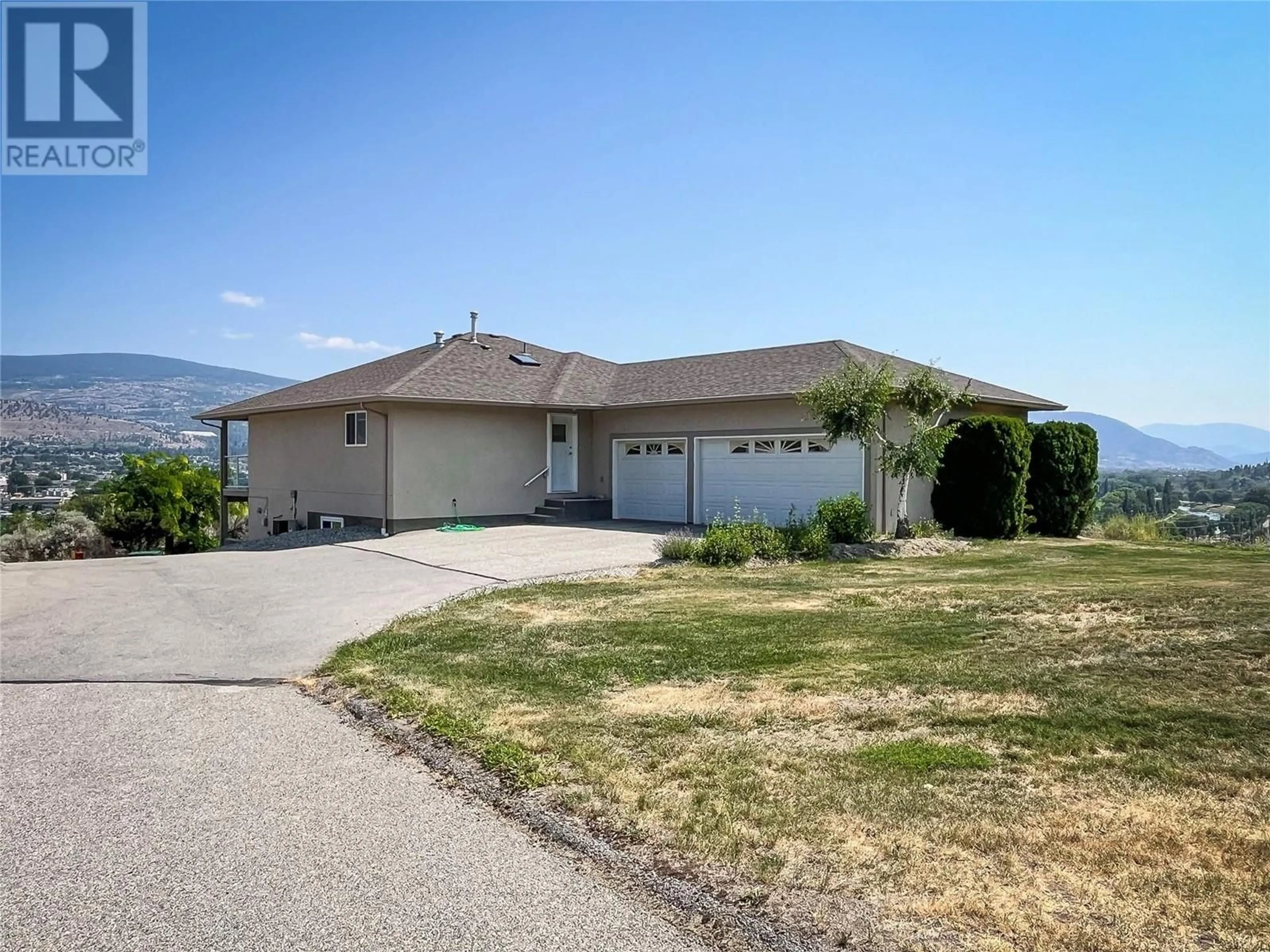 Frontside or backside of a home, the street view for 398 Ridge Road, Penticton British Columbia V2A8N7