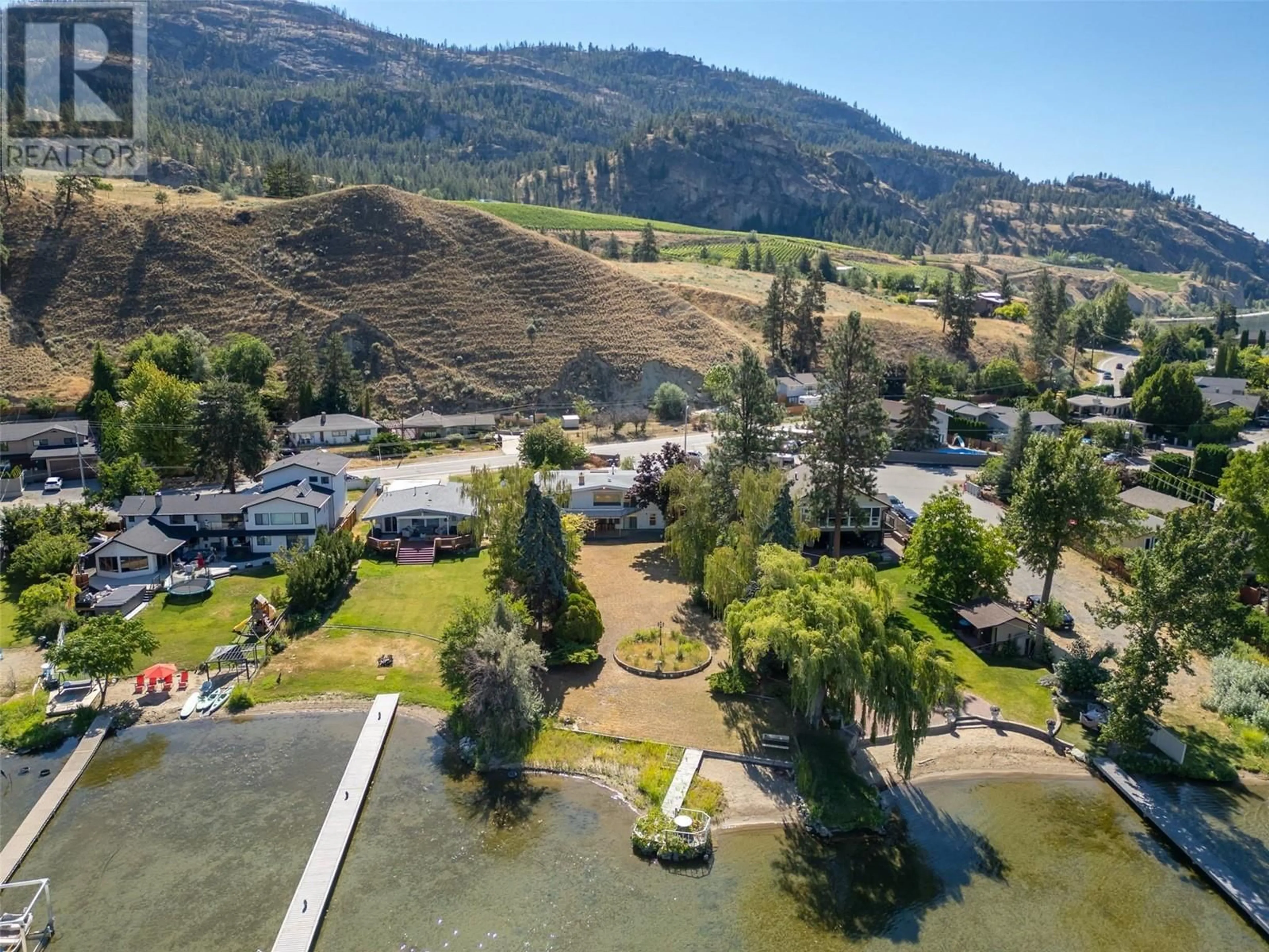 A pic from exterior of the house or condo, the view of lake or river for 102 Derenzy Place, Penticton British Columbia V2A8W7