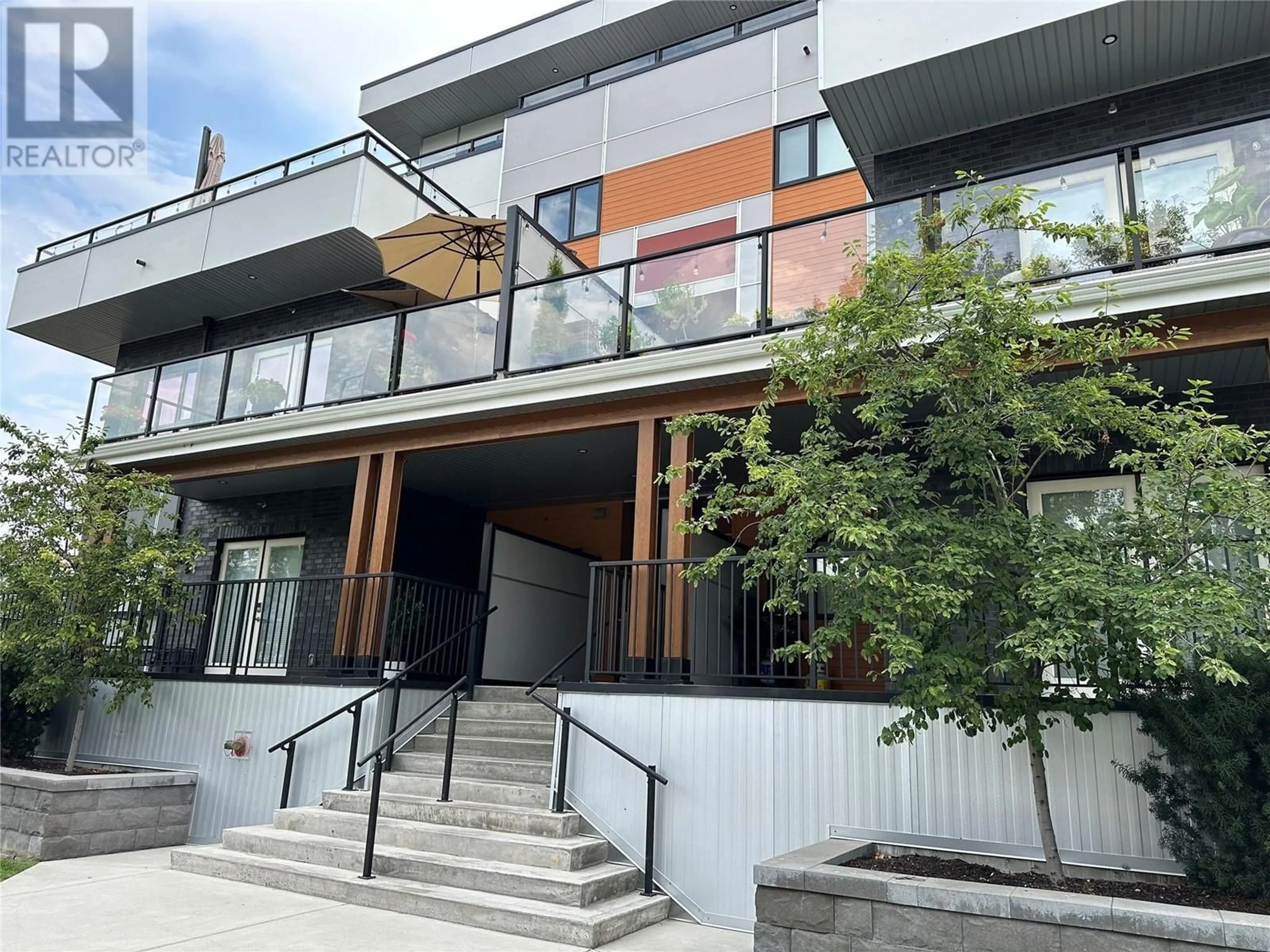 A pic from exterior of the house or condo, the front or back of building for 1883 Water Street Unit# 209, Kelowna British Columbia V1Y1K4