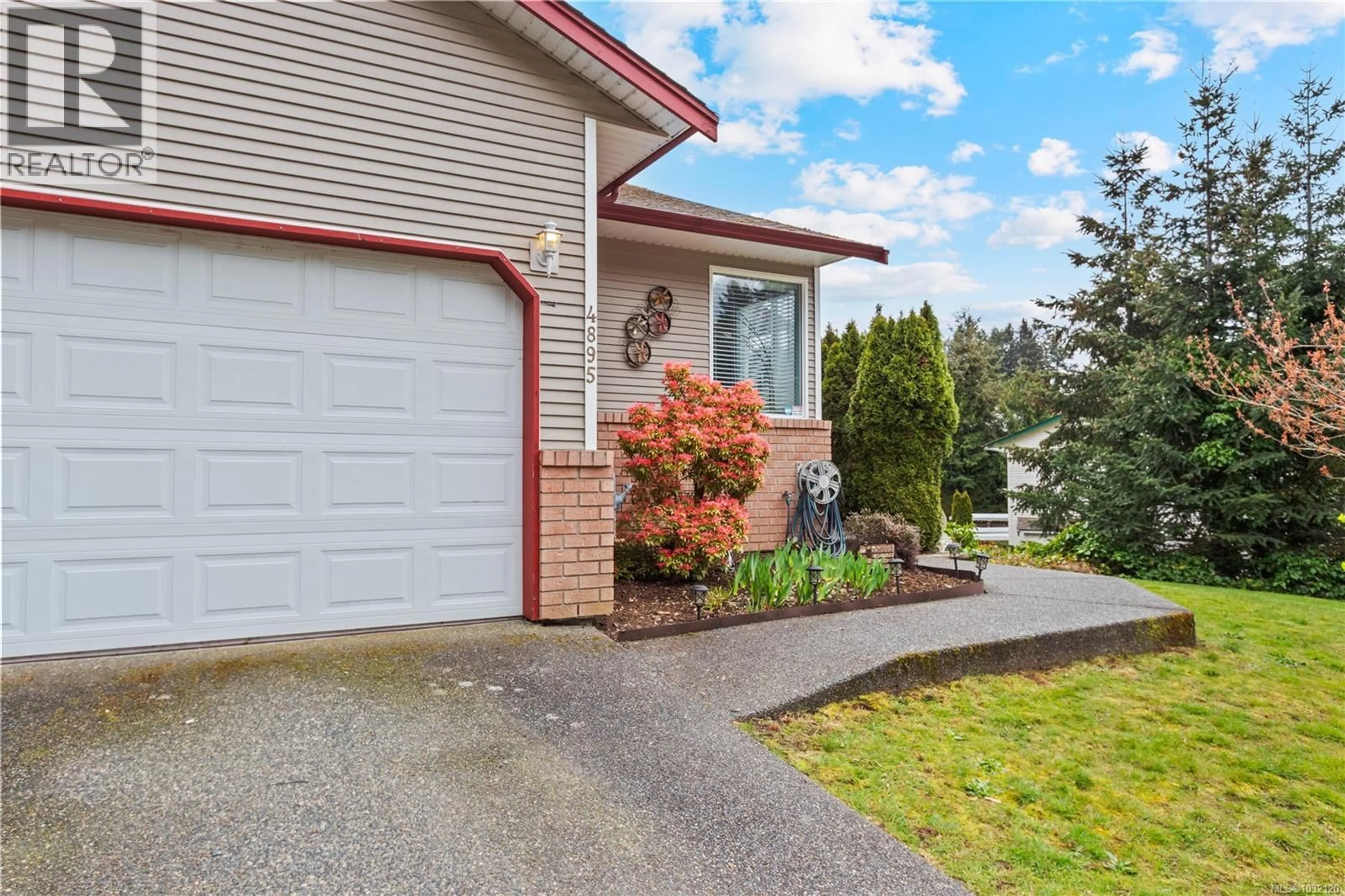 Home with vinyl exterior material, street for 4895 FAIRBROOK CRESCENT, Nanaimo British Columbia V9T6L6