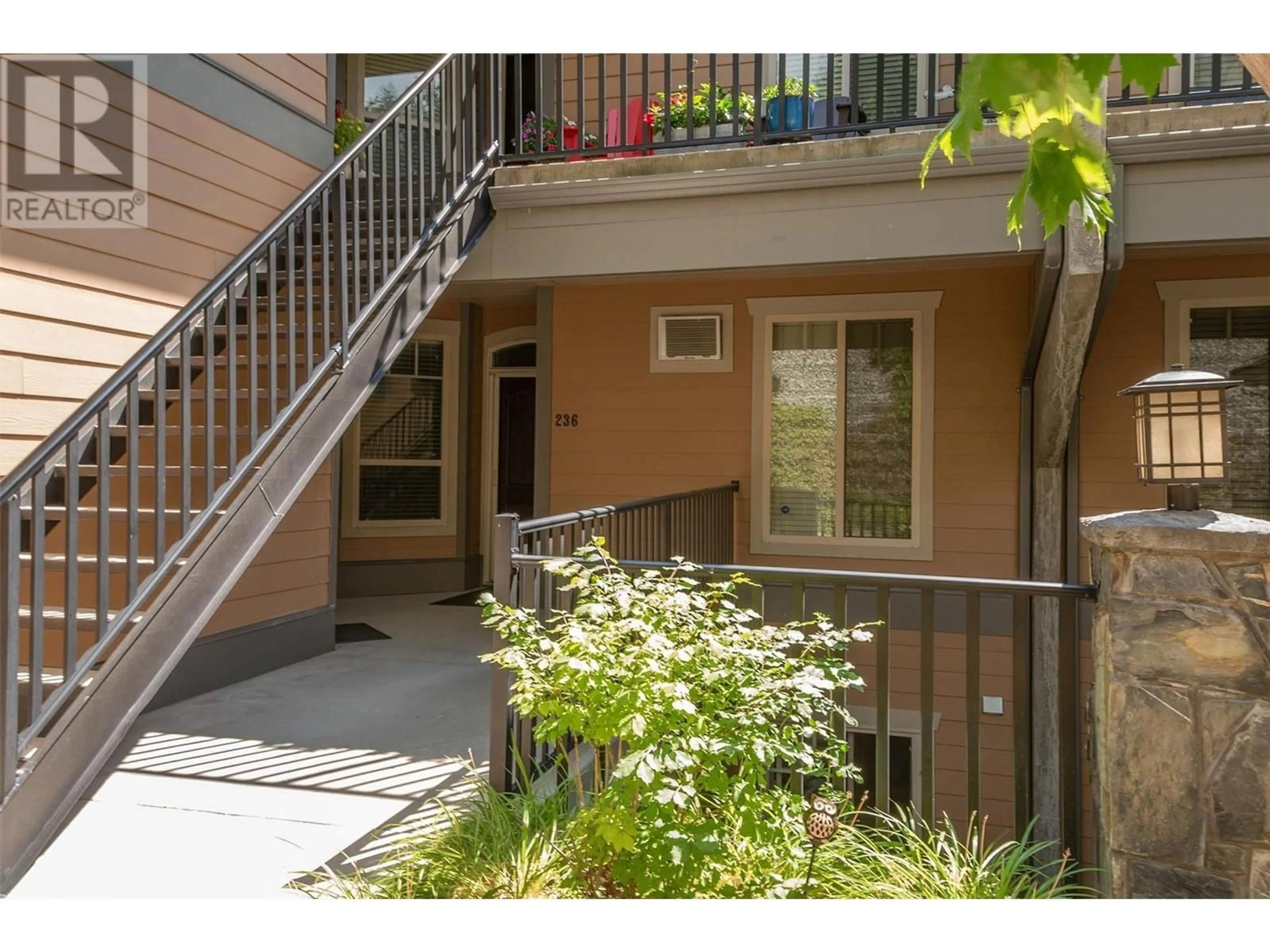 A pic from exterior of the house or condo, the fenced backyard for 4350 Ponderosa Drive Unit# 236 Lot# 86, Peachland British Columbia V0H1X5