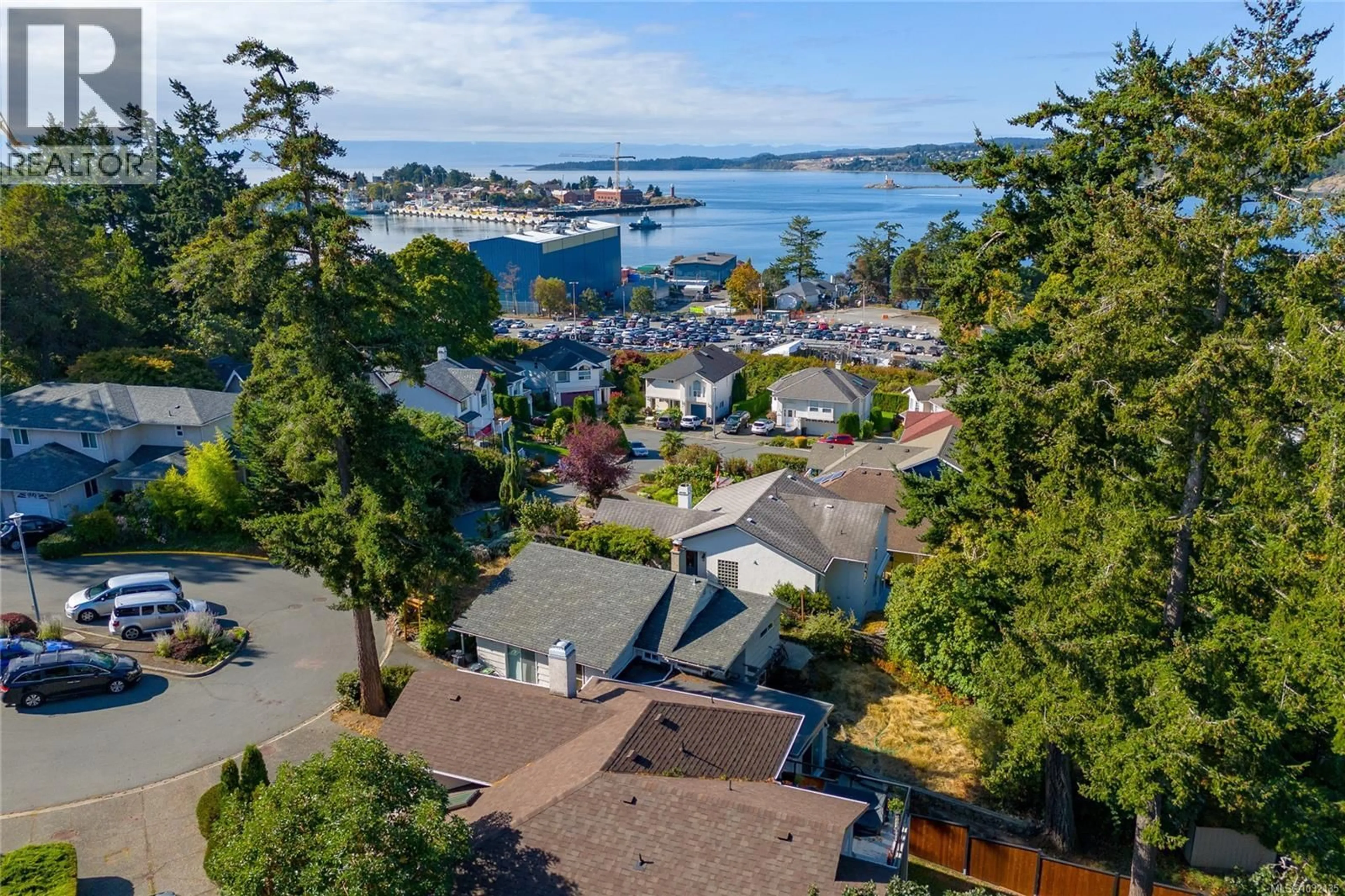 A pic from outside/outdoor area/front of a property/back of a property/a pic from drone, water/lake/river/ocean view for 715 LUSCOMBE PLACE, Esquimalt British Columbia V9A7L6