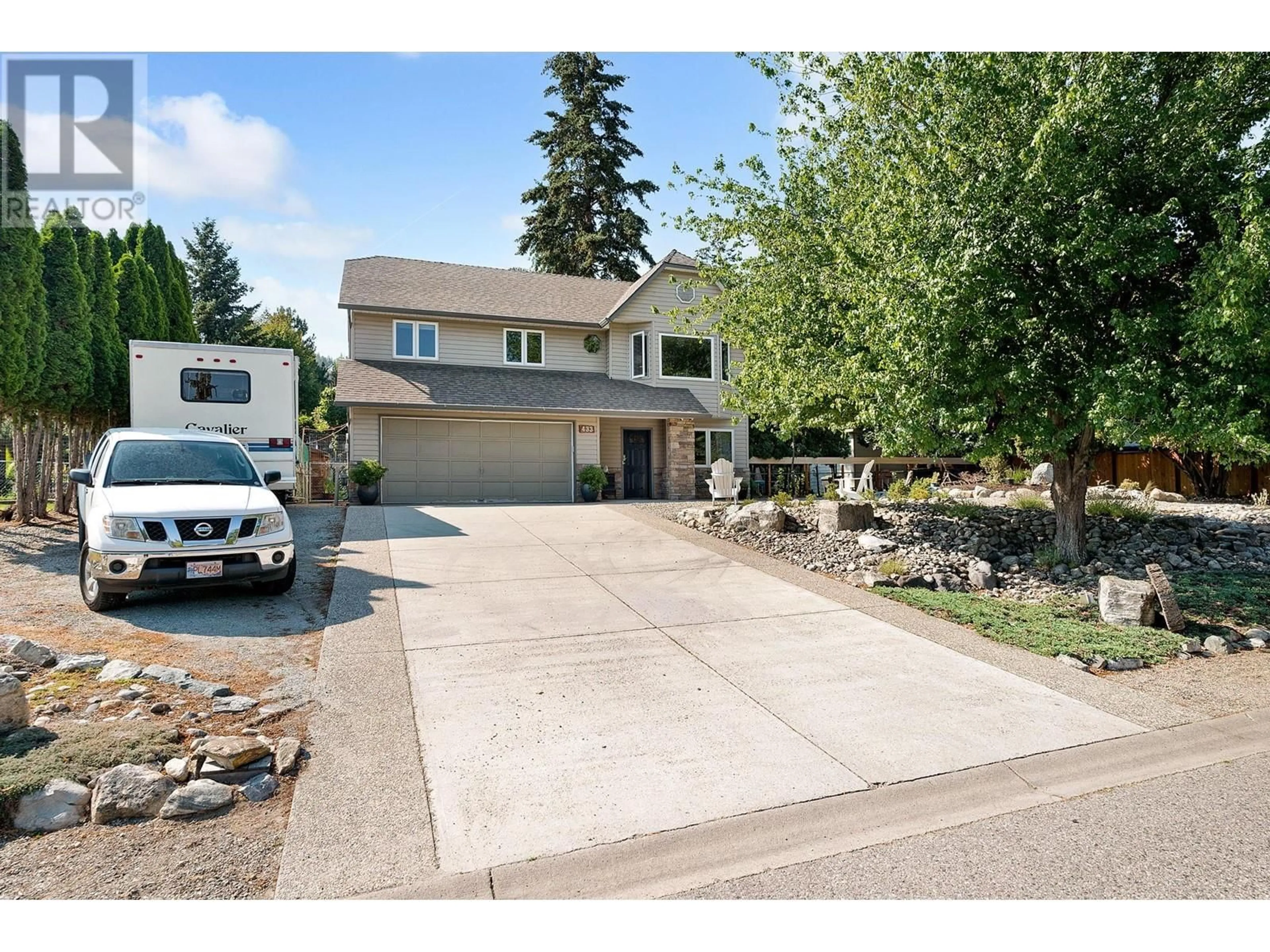 Frontside or backside of a home, the street view for 433 Trumpeter Road Lot# 4, Kelowna British Columbia V1W4L5