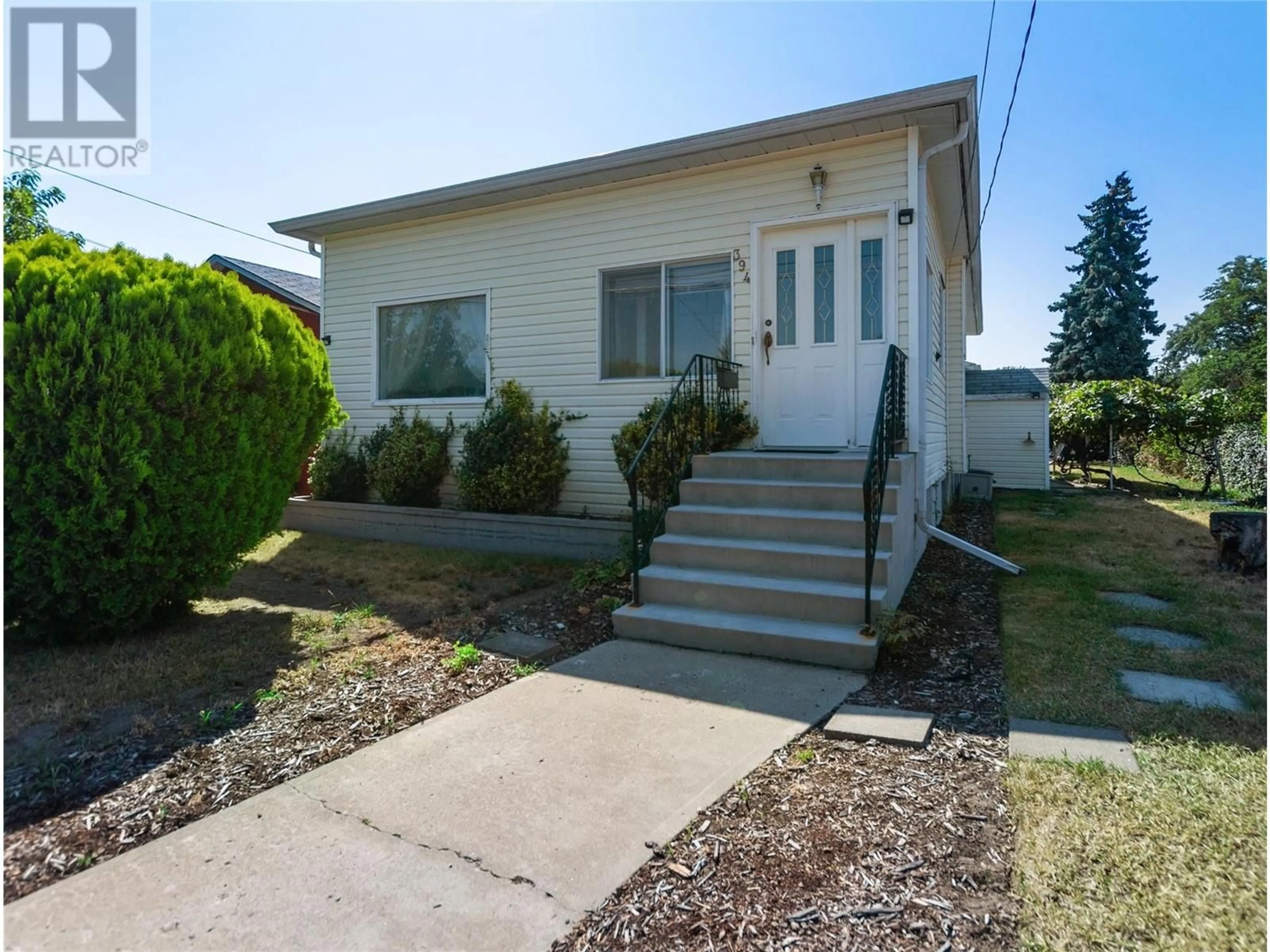 Frontside or backside of a home, cottage for 394 WADE Avenue, Penticton British Columbia V2A1V1