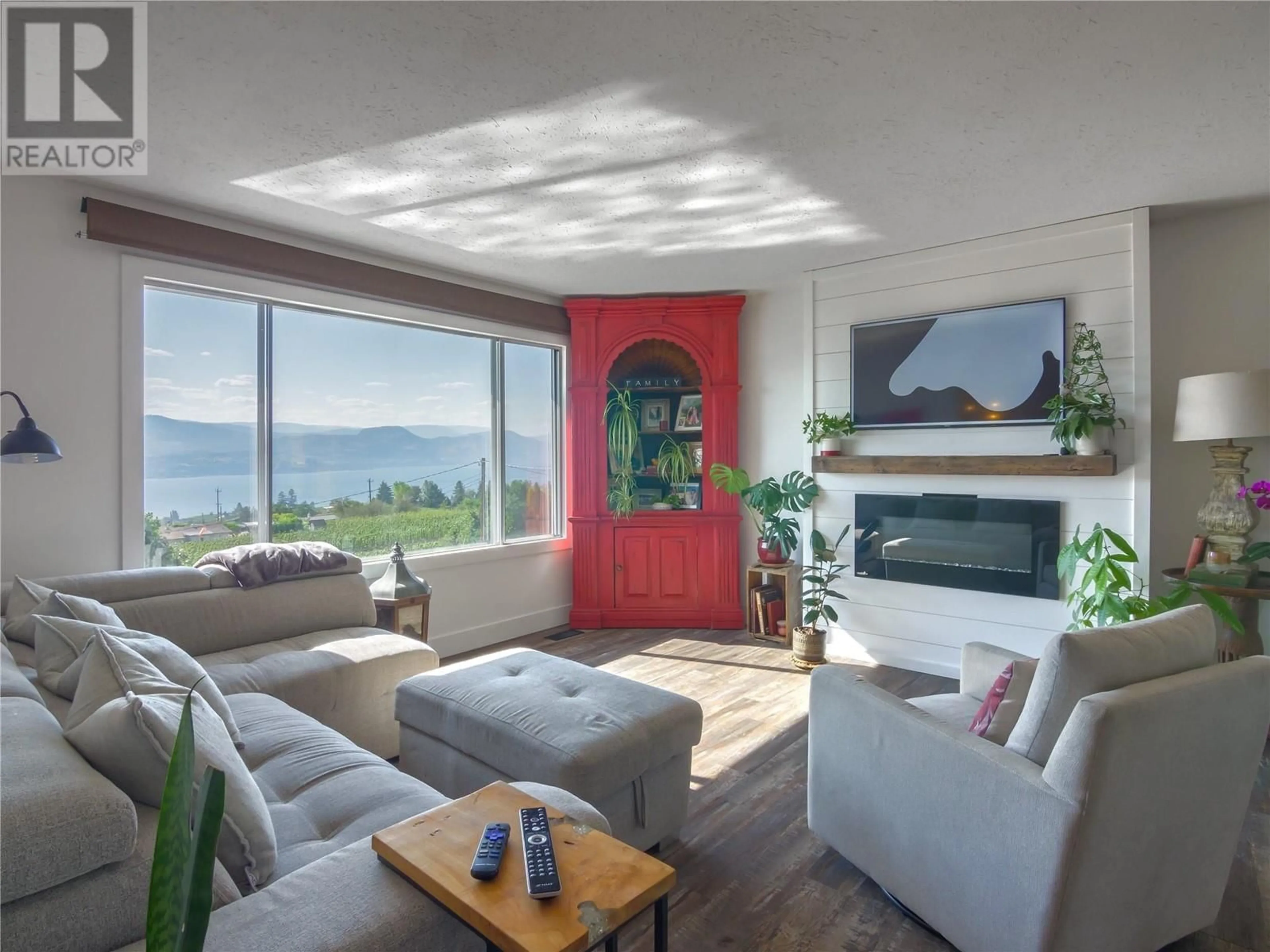 Living room, wood floors for 3830 Albrecht Road, Naramata British Columbia V0H1N1