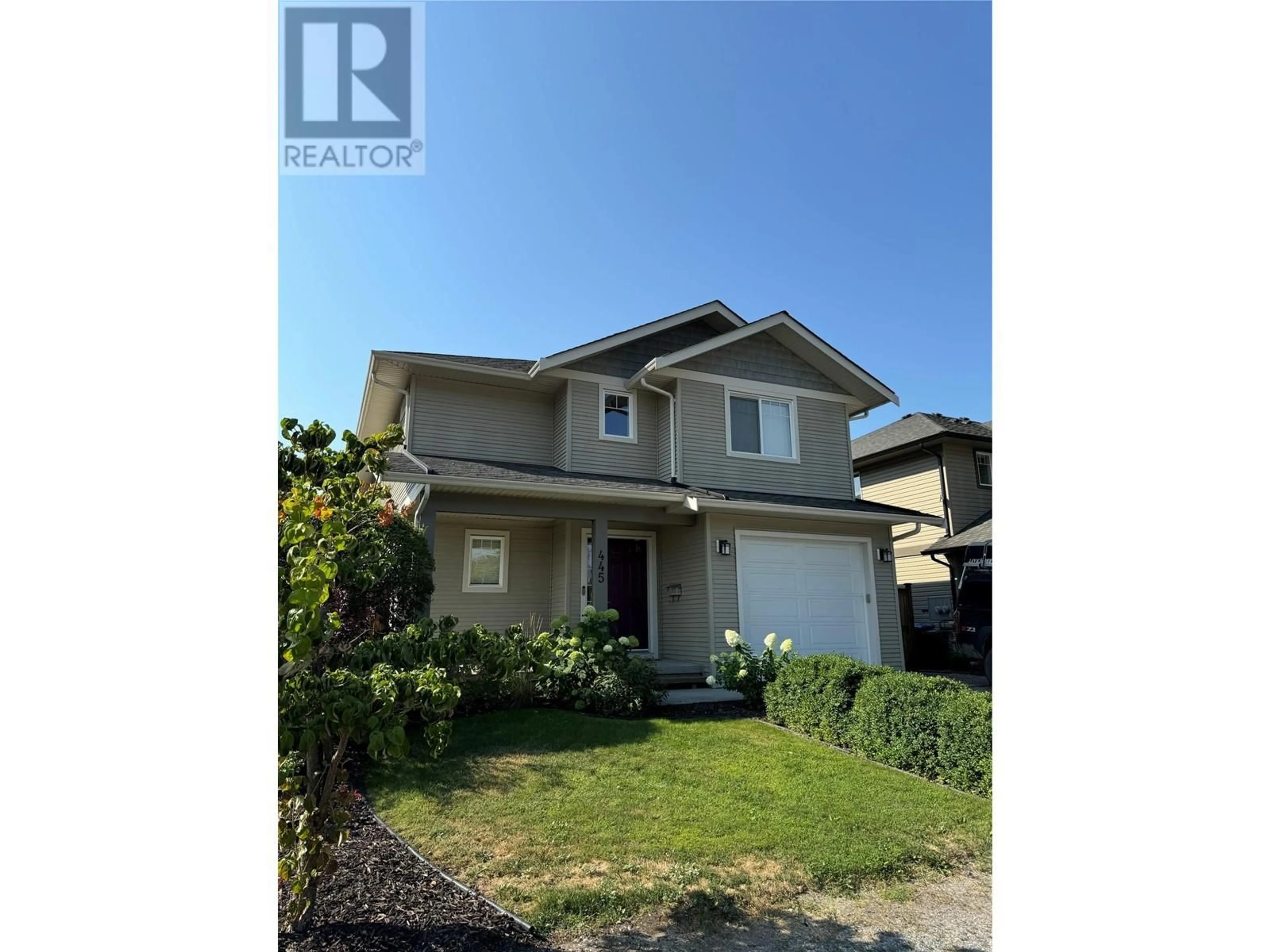 Frontside or backside of a home, the street view for 445 Hardie Road, Kelowna British Columbia V1X2H3