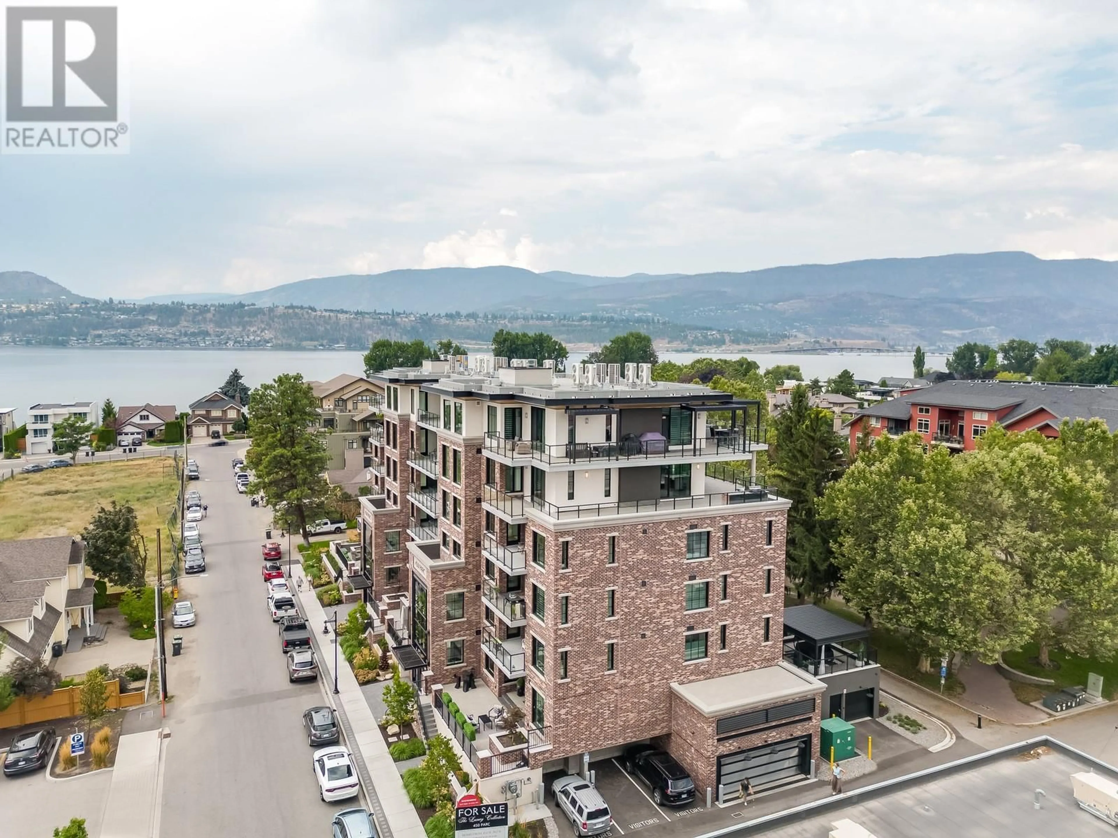 A pic from exterior of the house or condo, the street view for 450 Groves Avenue Unit# 302, Kelowna British Columbia V1Y4Y5