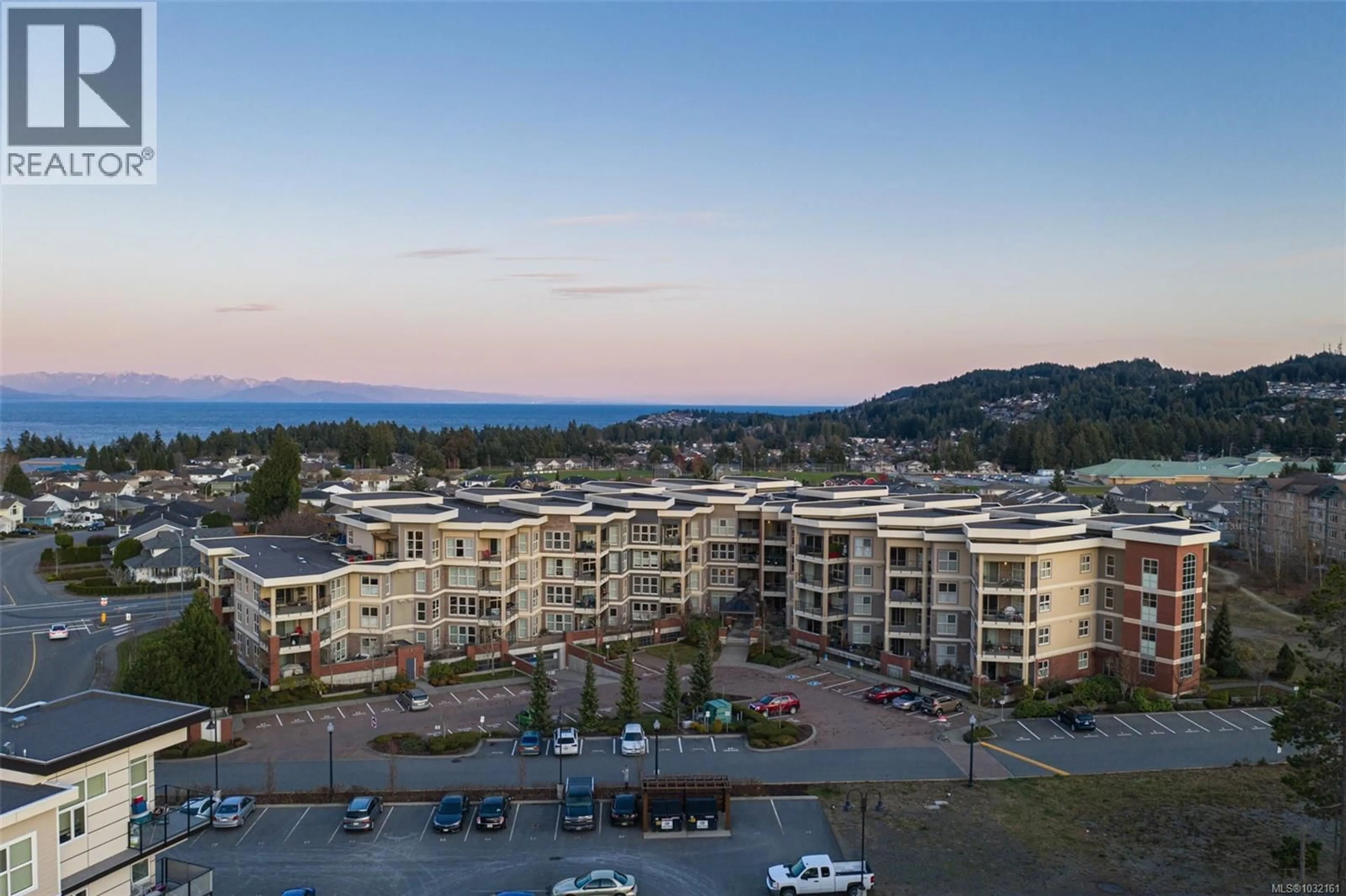 A pic from outside/outdoor area/front of a property/back of a property/a pic from drone, mountain view for 109 - 6310 MCROBB AVENUE, Nanaimo British Columbia V9V1W8