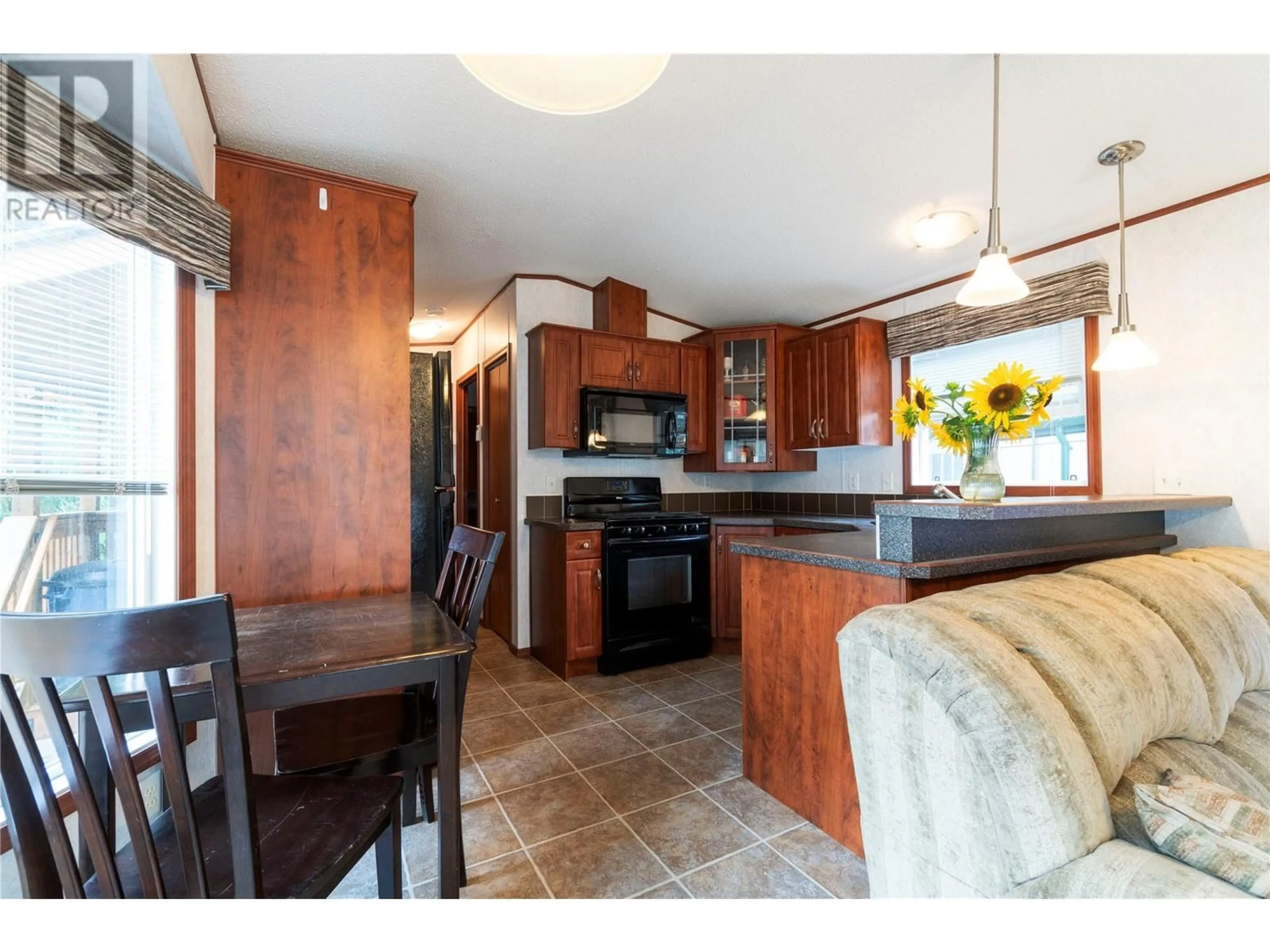 Open concept kitchen for 6670 Trans Canada Highway NE Unit# 120, Canoe British Columbia V0E1K0