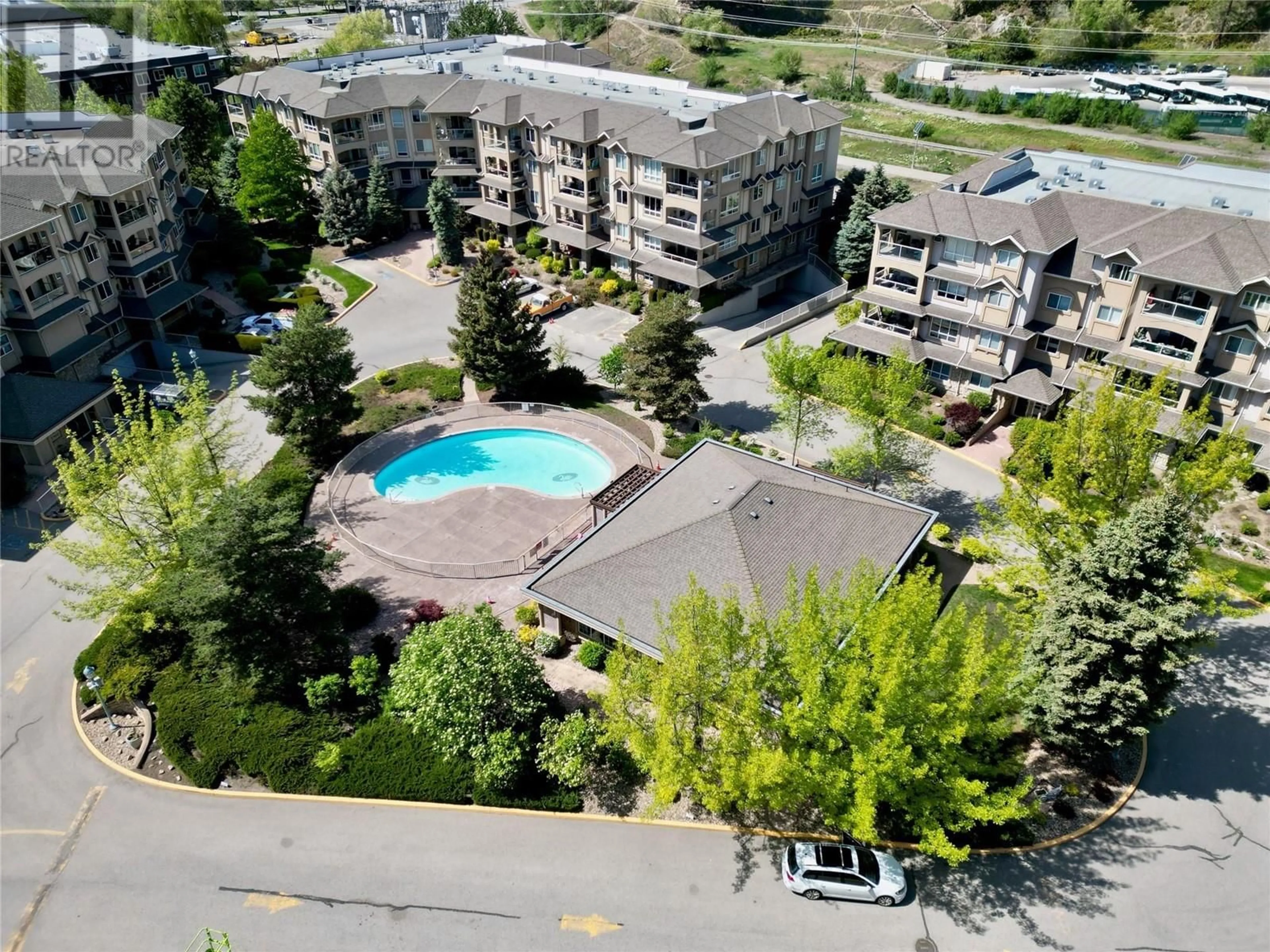 A pic from exterior of the house or condo for 1966 Enterprise Way Unit# 210, Kelowna British Columbia V1Y9S8