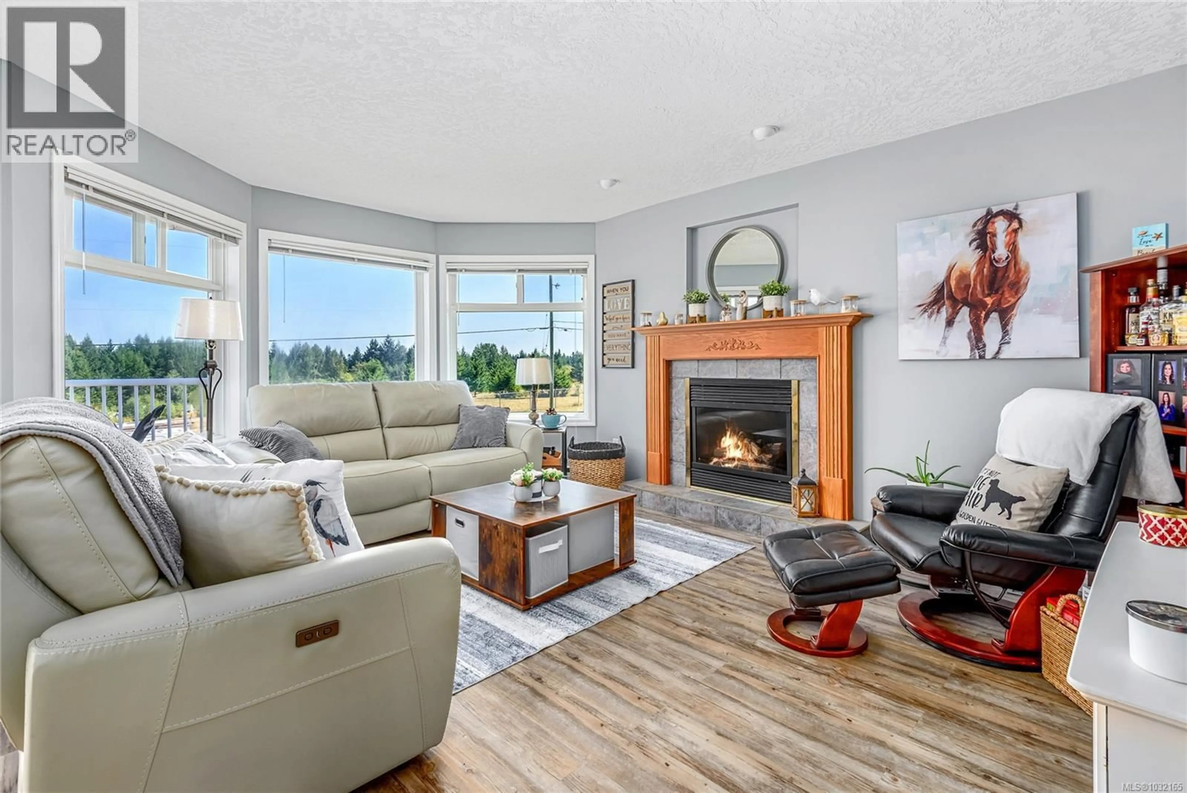 Living room with furniture, unknown for 2207 JUNE ROAD, Courtenay British Columbia V9J1X9